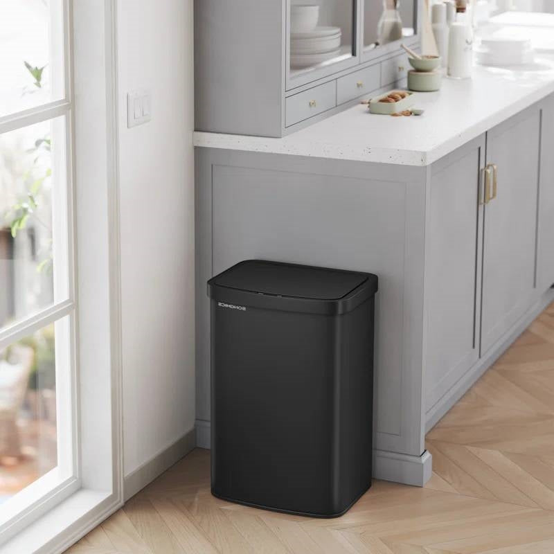 Black 13-gallon Kitchen Trash Can with motion sensor lid and carbon filter by HomePacific, showing sleek design and sensor mechanism.