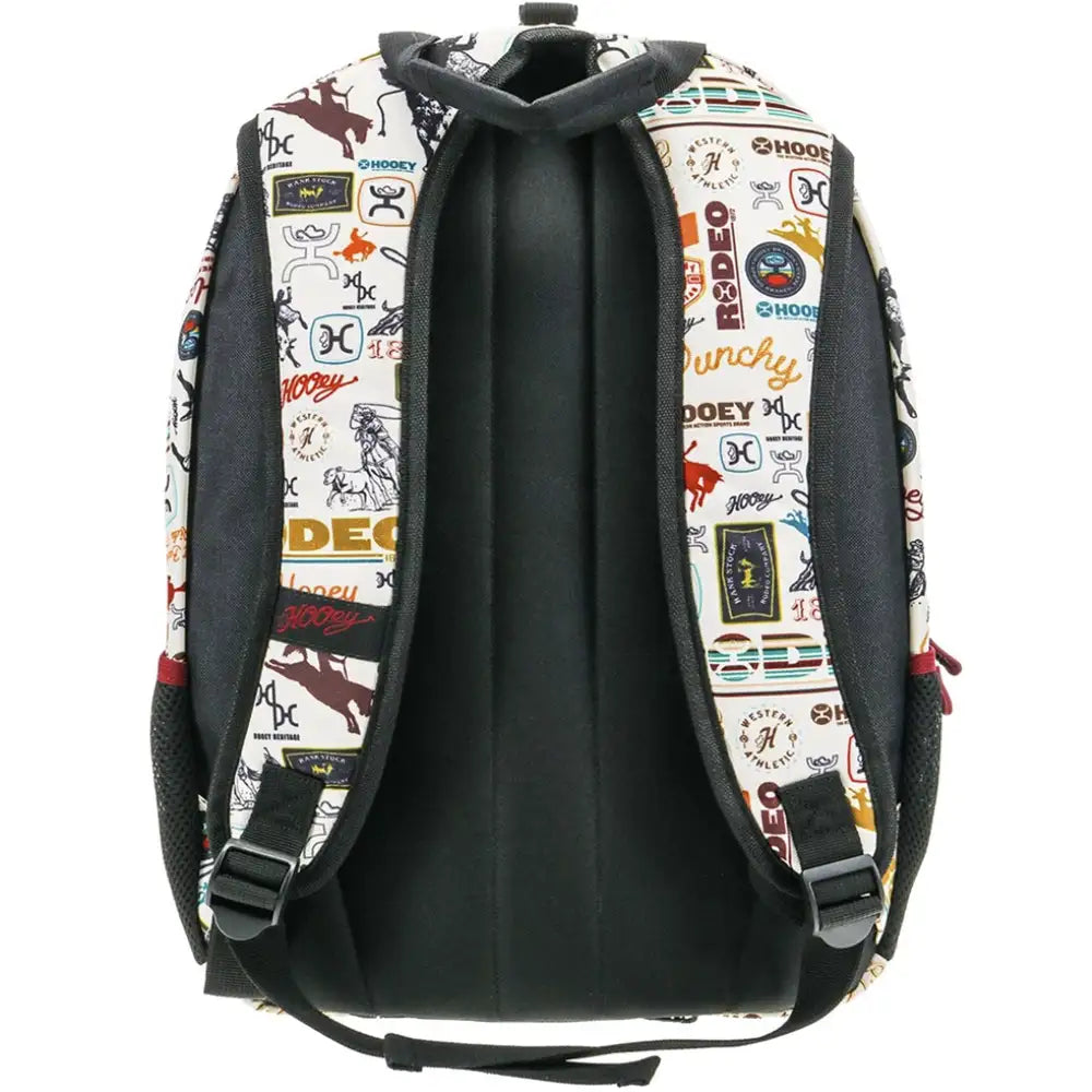Cream and black HOOey Rockstar Rodeo Pattern backpack with adjustable straps and multiple compartments, featuring rodeo-themed design.