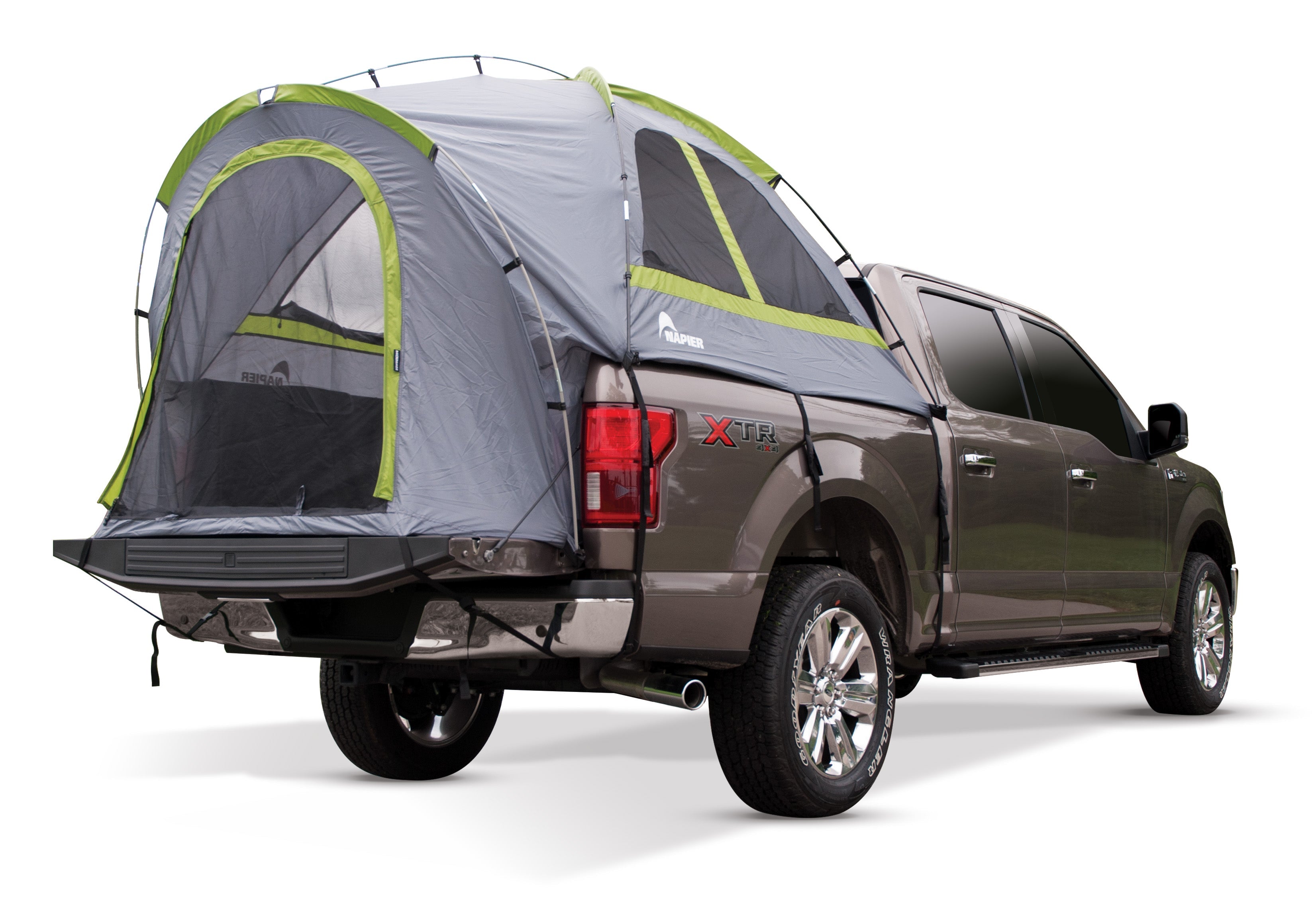 Backcountry Sportsman truck tent set up on a pickup truck in a scenic outdoor setting.