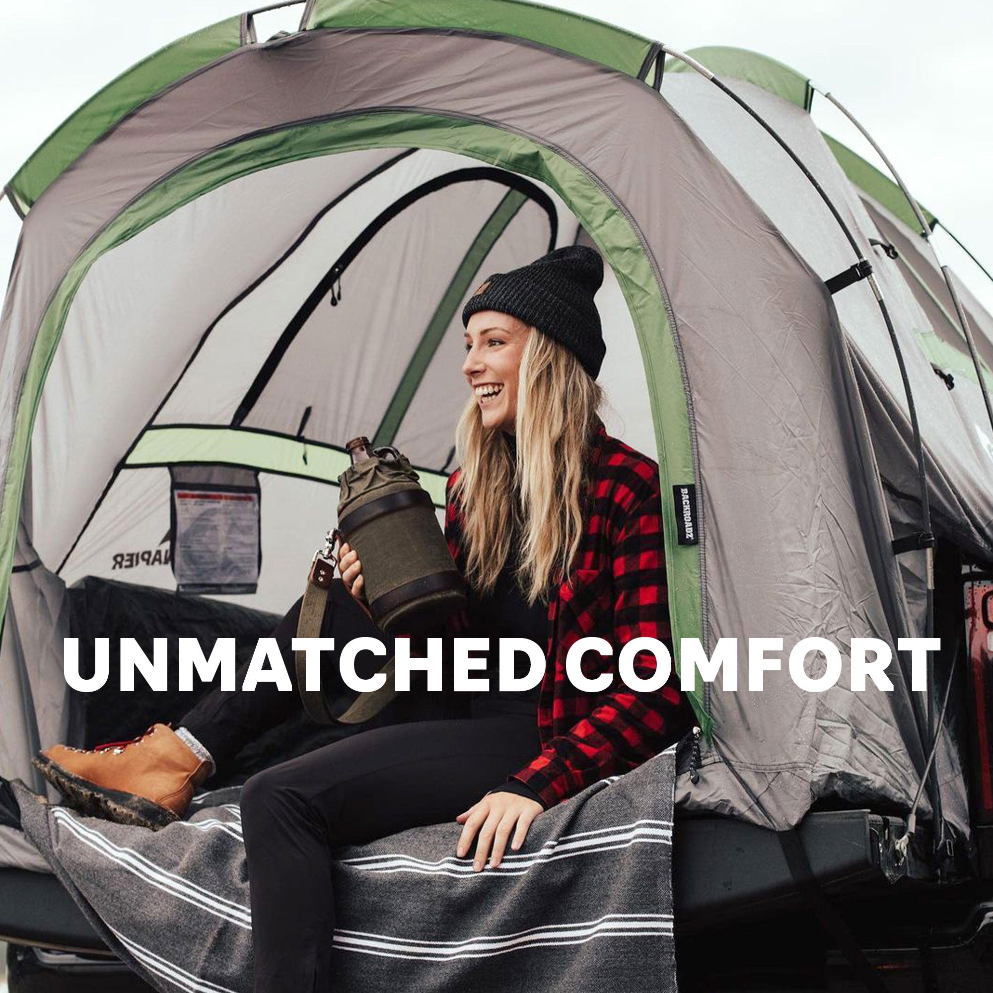 Backcountry Sportsman truck tent set up on a pickup truck, showcasing its spacious design and durable fabric for outdoor camping.