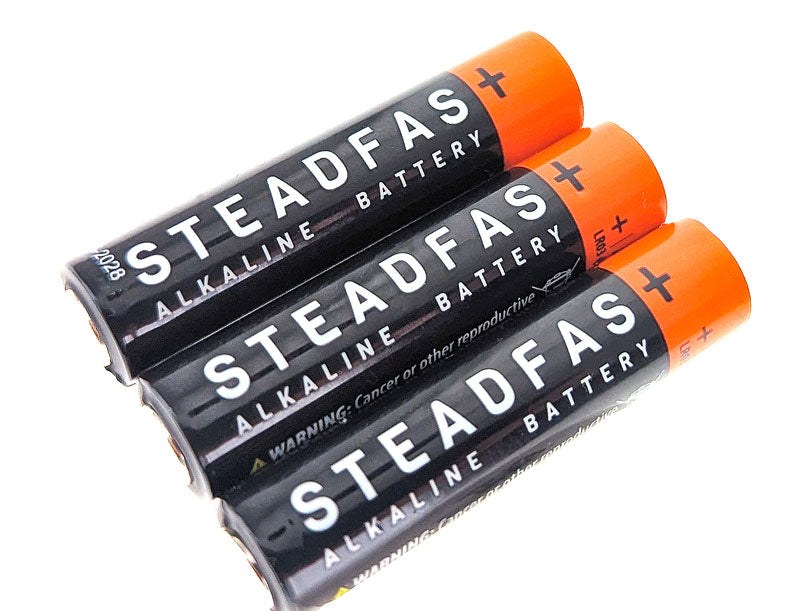 Three heavy-duty AAA batteries from QuakeKits, ideal for powering tools and household devices, shown in a 3-pack.