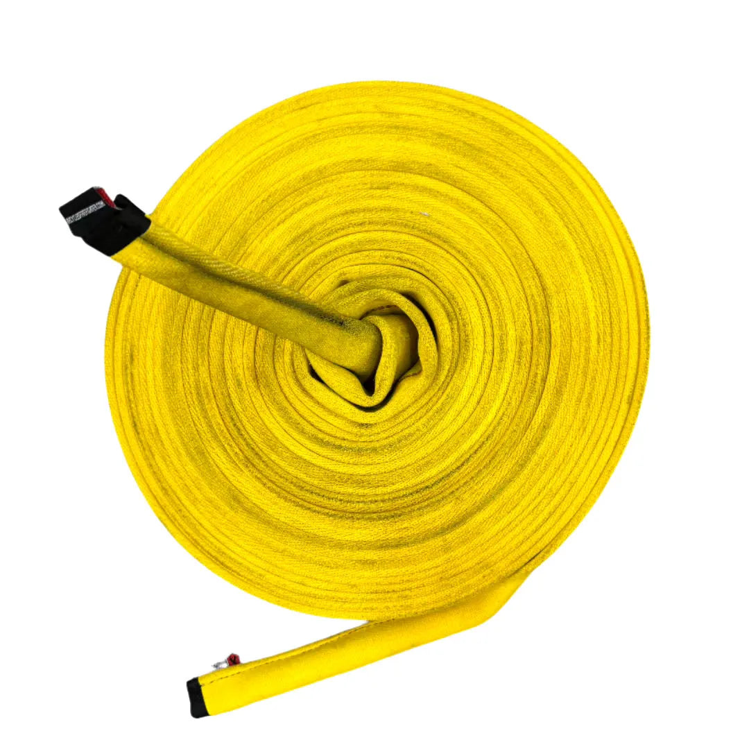 Yellow 50-foot Cadet Cord battle rope by Recycled Firefighter, showing thick, durable nylon rope for fitness and training.