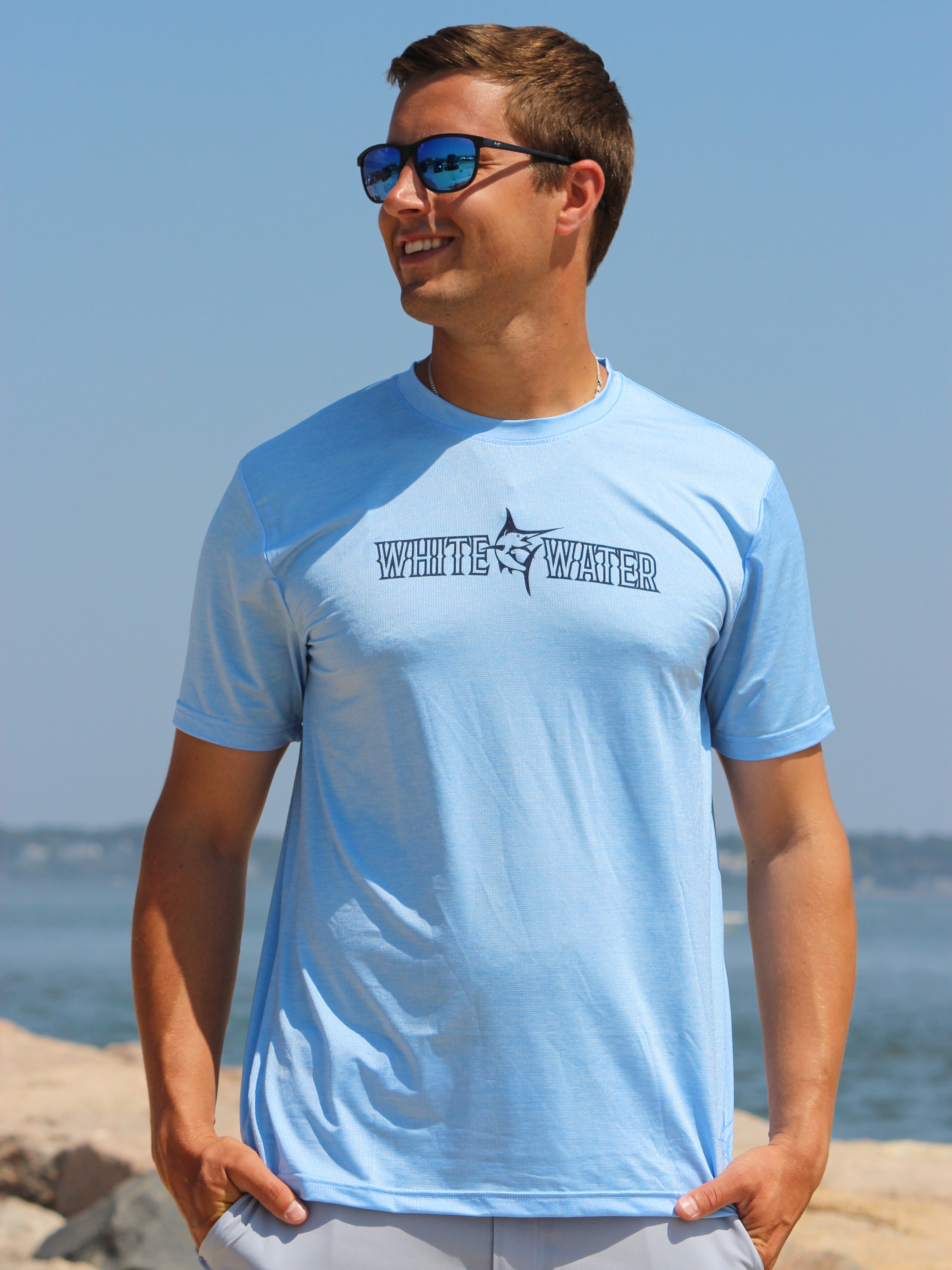 Bimini Primary Performance Tee by White Water Life, featuring short sleeves and a vibrant design for active wear.