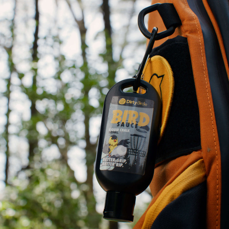 Close-up of Dirty Birdie Bird Sauce, a disc golf grip enhancer with a textured surface for improved grip and control.