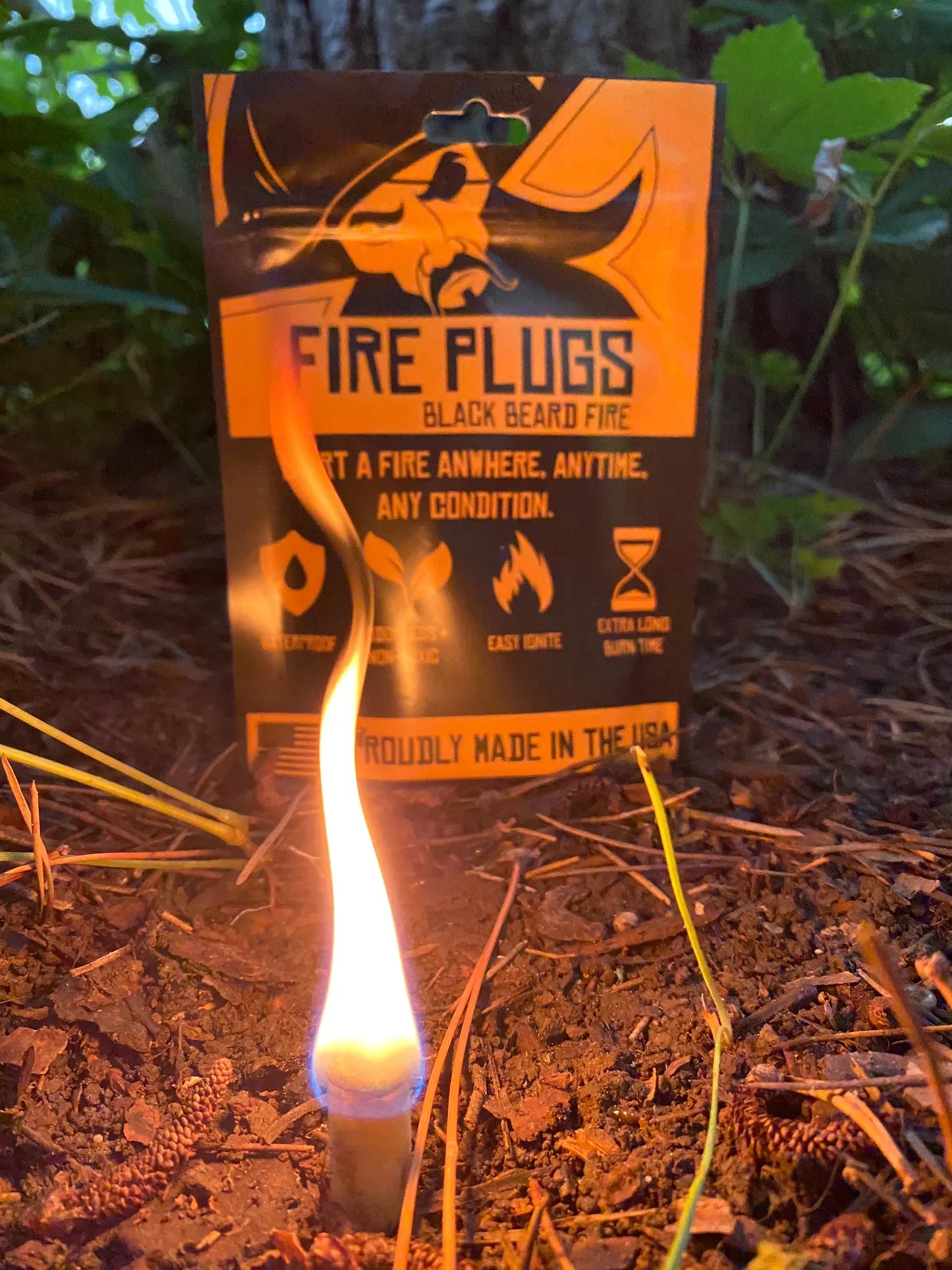 Black Beards Fire Plugs by Alpenglow Readiness Supply, outdoor fire starter tinders displayed in a natural setting.
