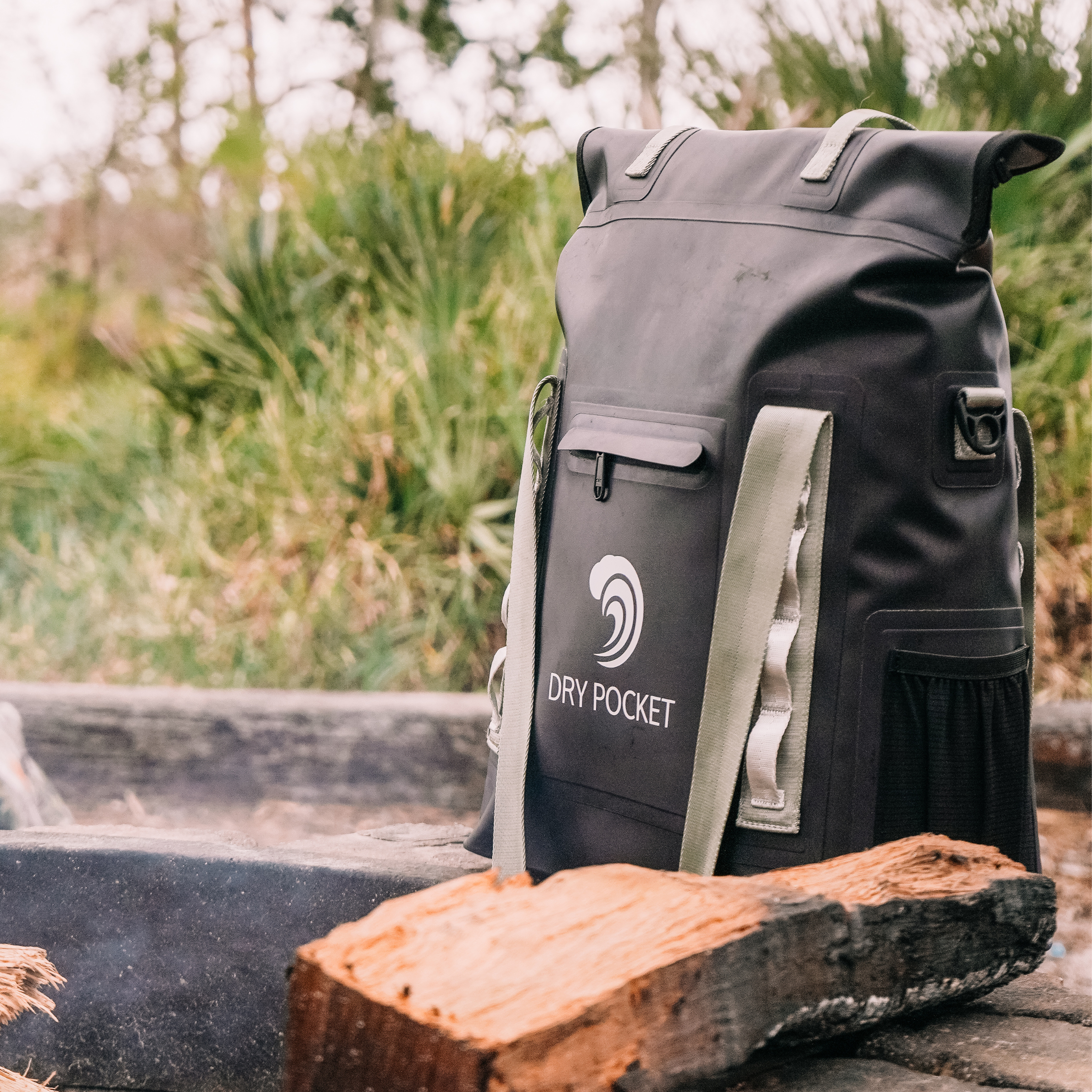 Black waterproof floating tote cooler by Dry Pocket featuring auto sealing design, ideal for keeping beverages and snacks dry.