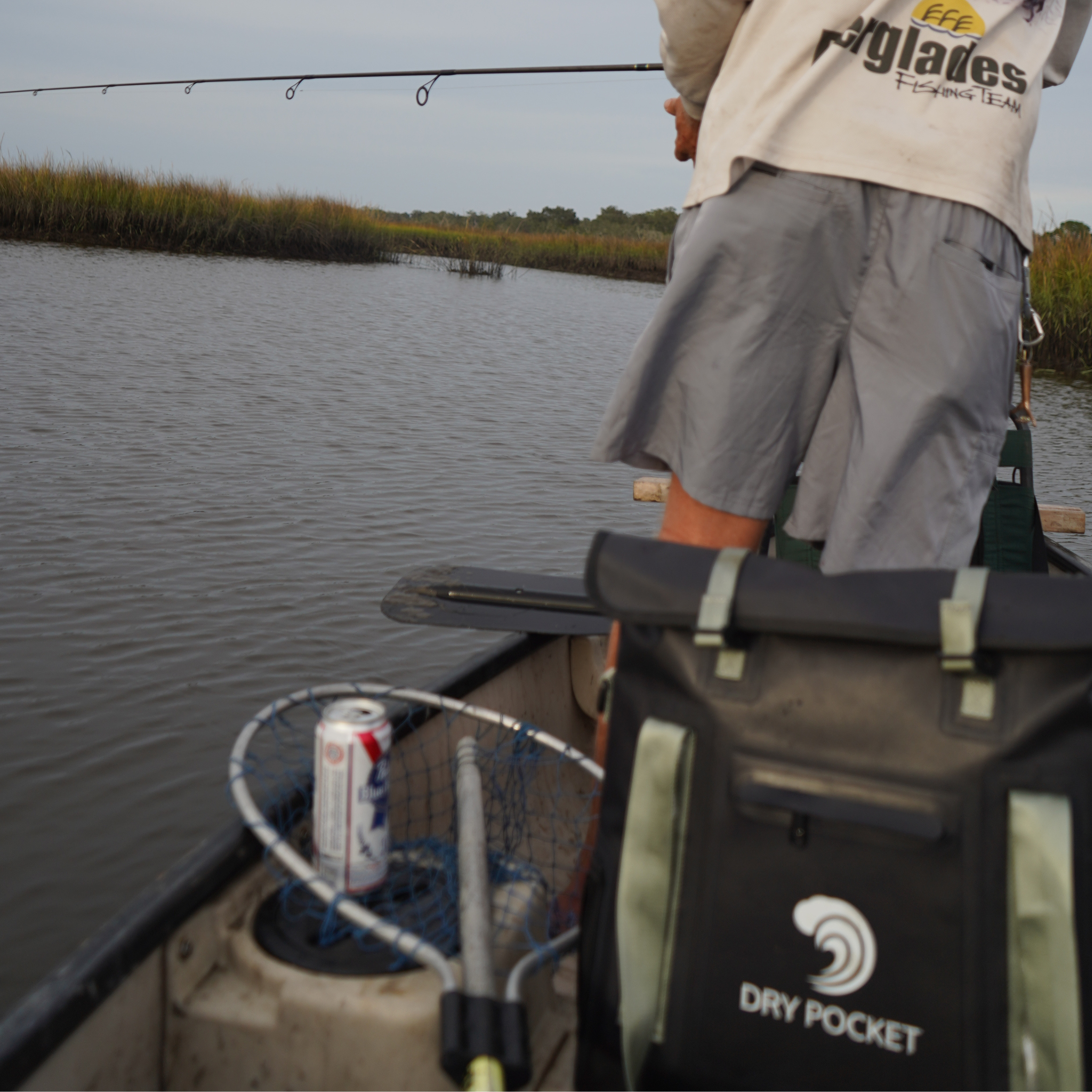 Black Dry Pocket waterproof floating tote cooler with auto-sealing lid, designed for keeping drinks and food dry and afloat.