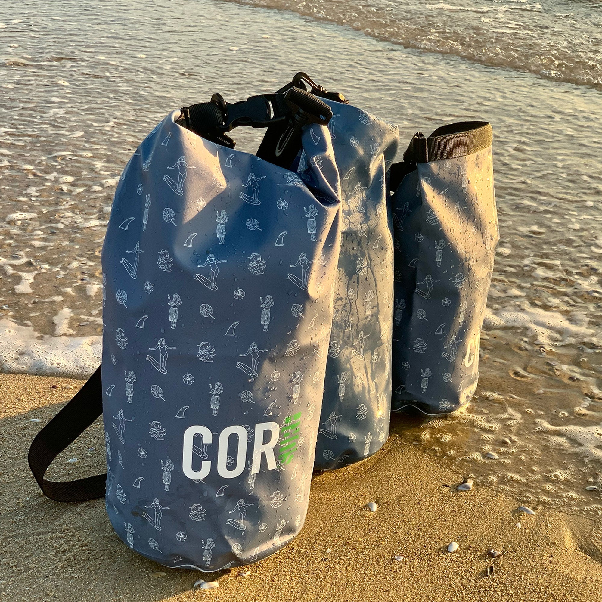 Blue Hawaiian print dry bag by COR Surf, 3L to 15L sizes and 3-pack waterproof accessories for outdoor adventures.