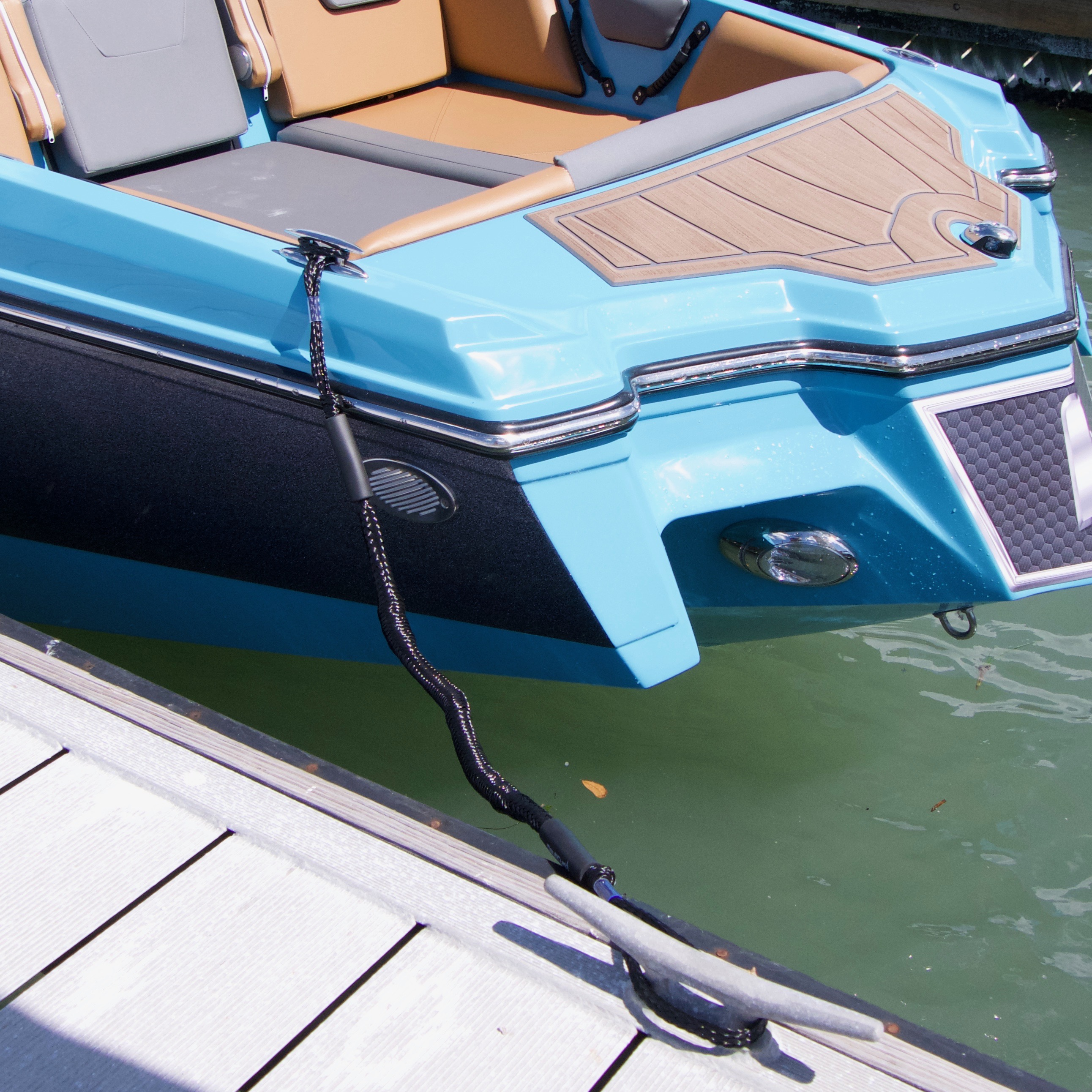 Two shock-absorbing bungee boat ropes from NautiCurl LLC, designed as dock lines for secure watercraft mooring.