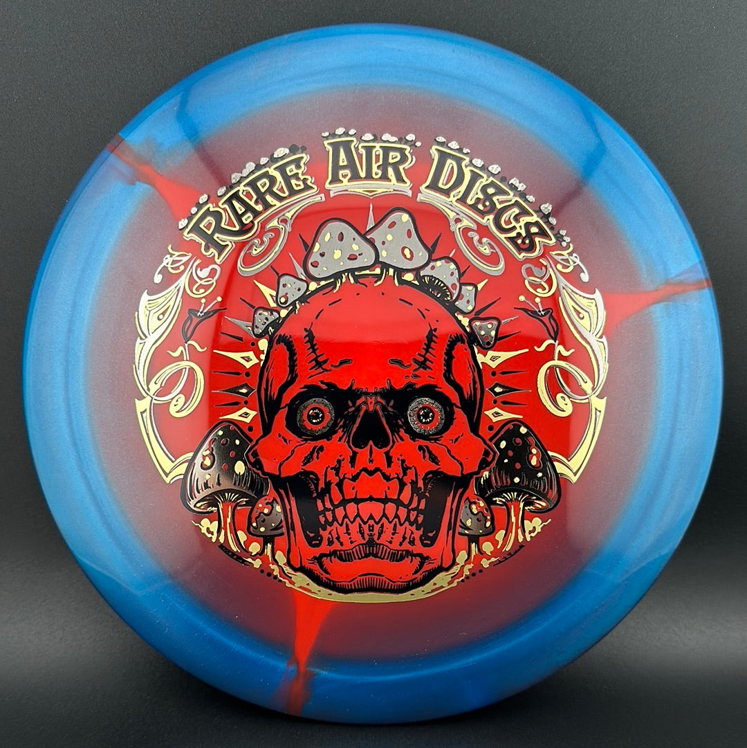 Rare Air Discs Halo S-Blend Conqueror disc golf disc with Crushin' Amanitas design, featuring a colorful, detailed graphic on the flight plate.