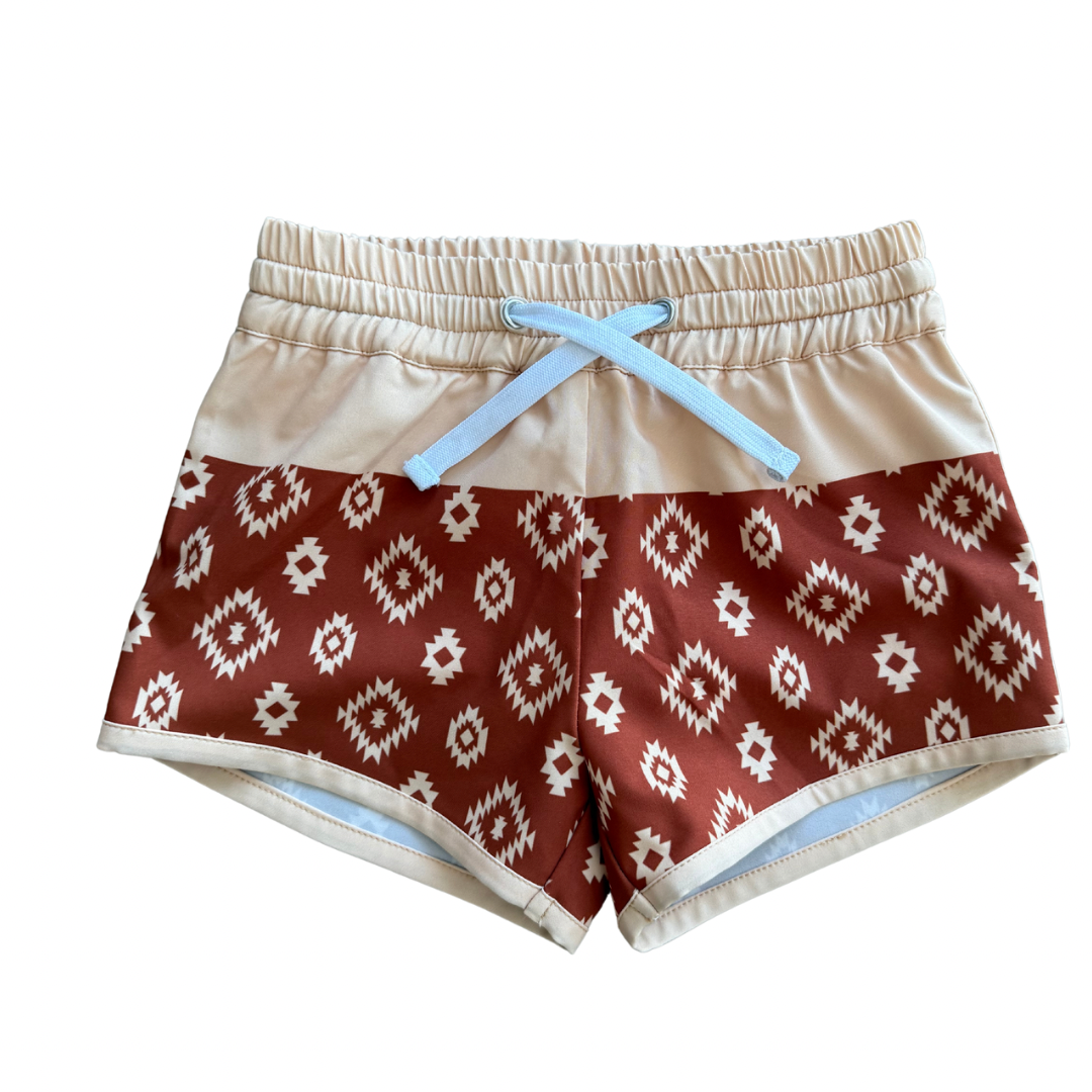 Color block hybrid shorts by Keep the Littles Wild featuring vibrant multi-color panels and a casual, sporty fit.