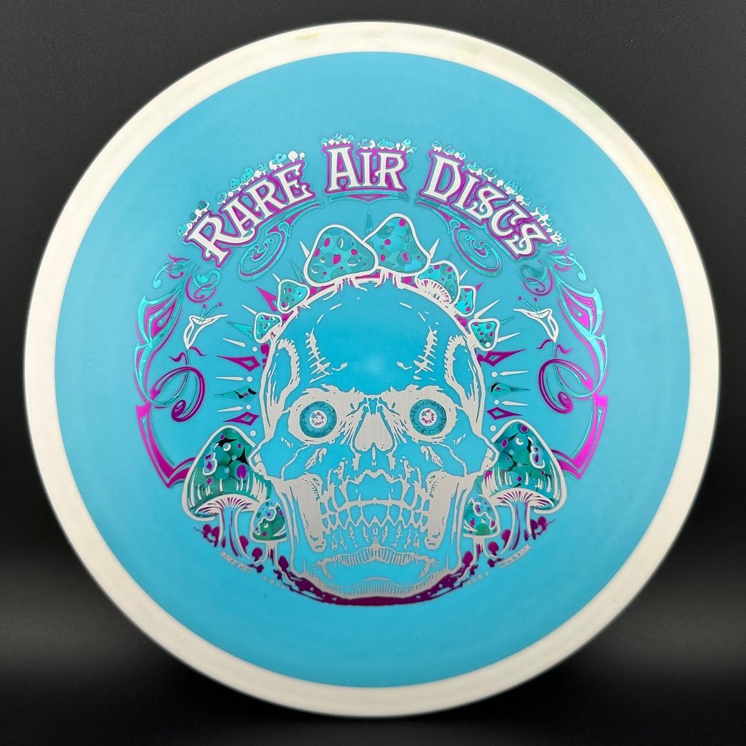 Rare Air Discs Fission Defy Crushin' Amanitas VIP 2.0 disc golf disc with vibrant colorful design featuring intricate patterns