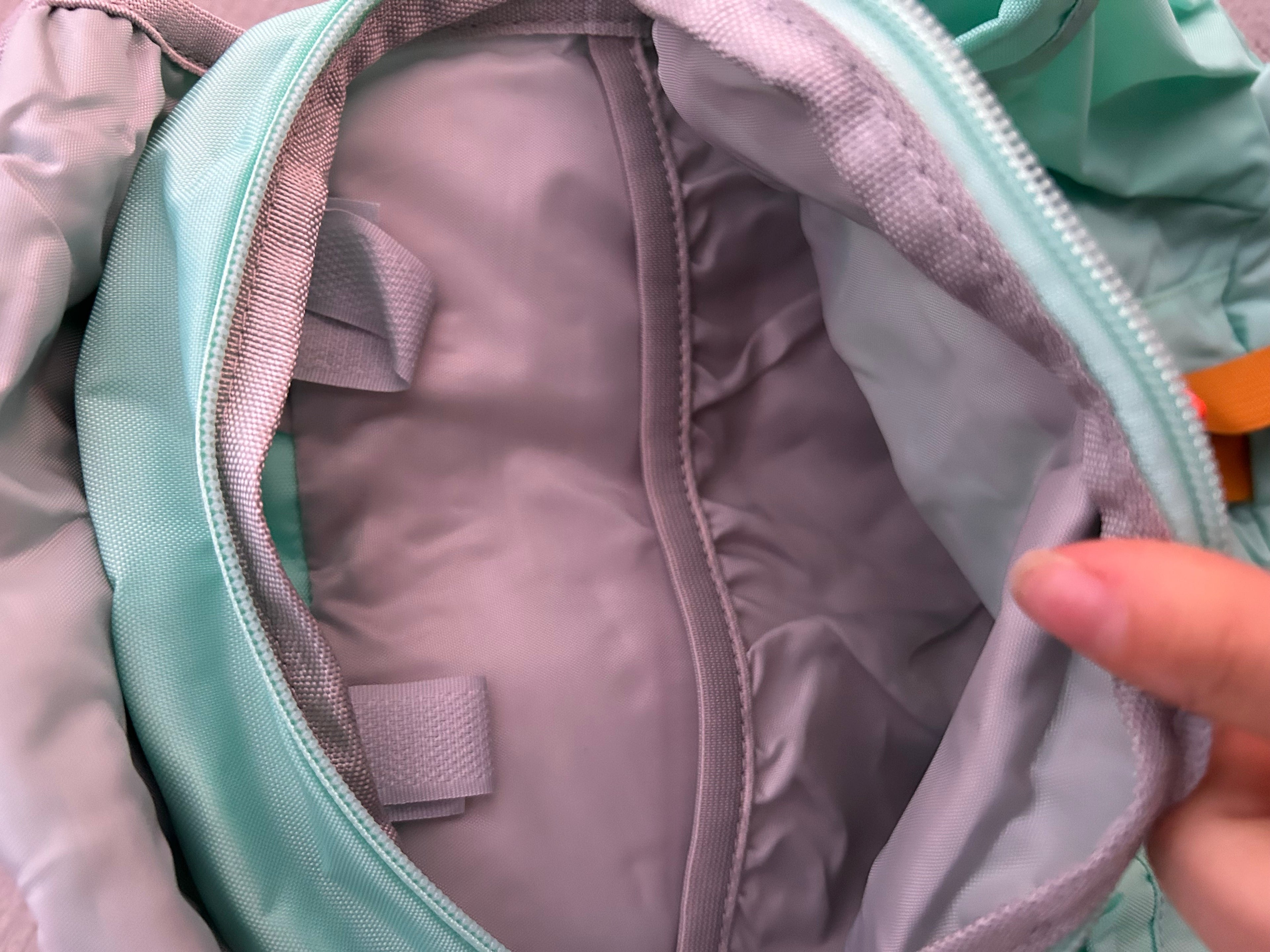 Light blue kids' hiking pack by Keep the Littles Wild with water bladder system, designed for young hikers ages 2 to 7.