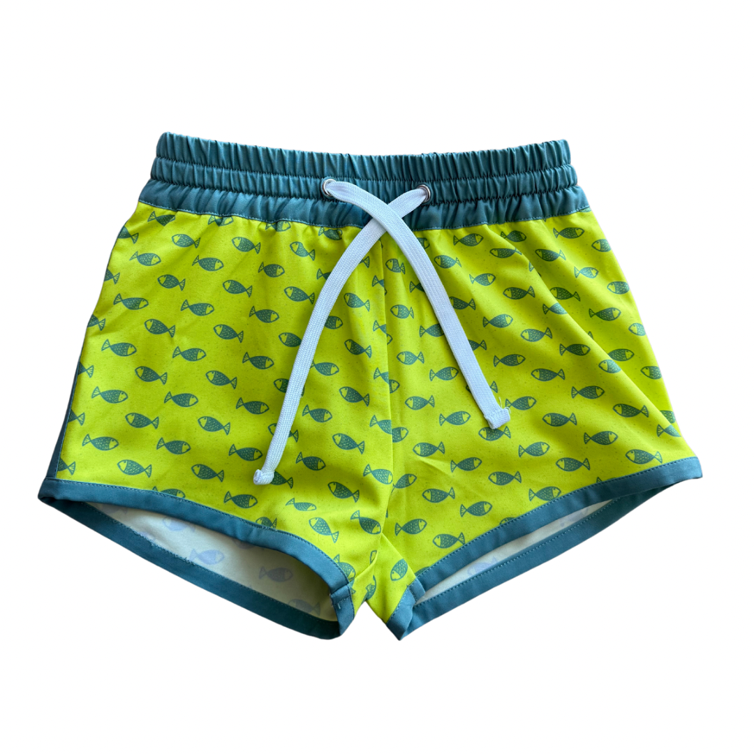 Neon fish hybrid shorts by Keep the Littles Wild featuring vibrant fish pattern and bright neon colors for a bold summer look.