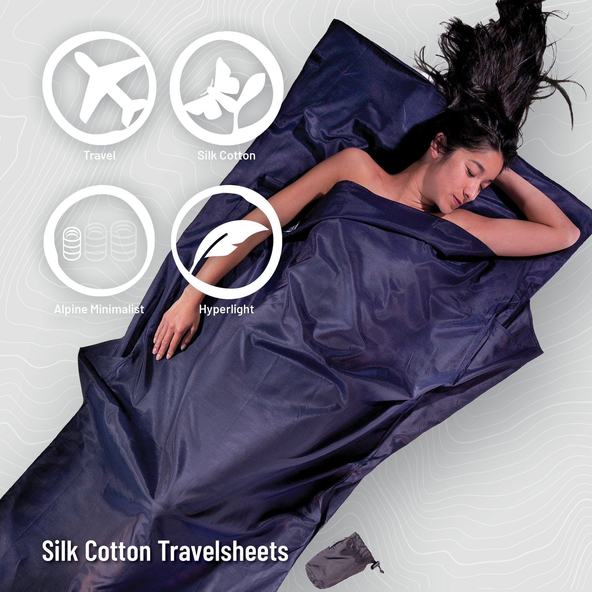 COCOON Coupler TravelSheet™ made of silk and cotton, shown folded, compact travel bedding for comfort and convenience.
