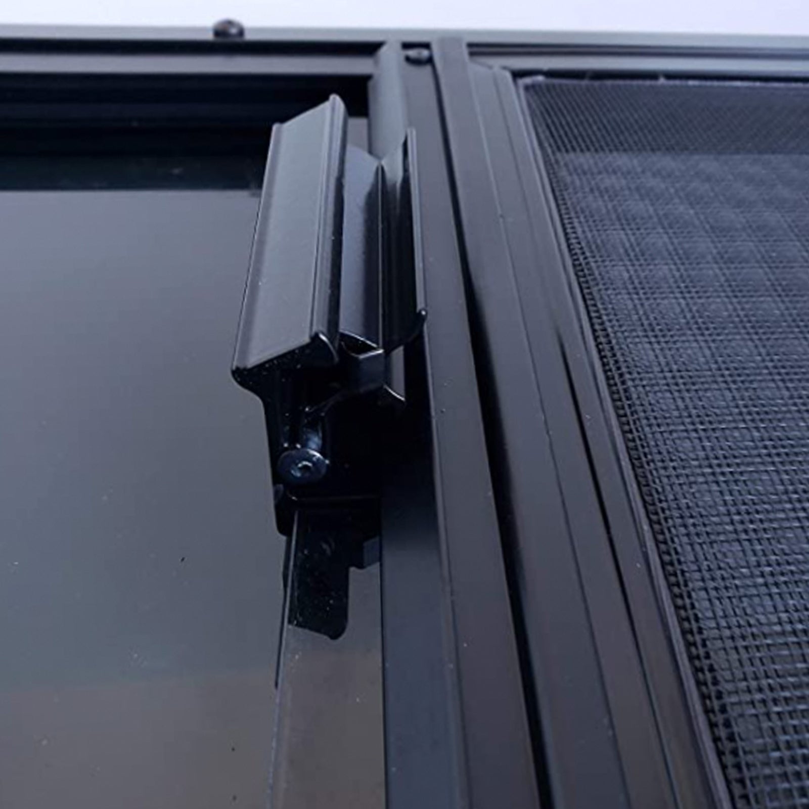 Half slider bunk windows by The Van Mart, showcasing a modern design and clear glass for optimal light and ventilation.