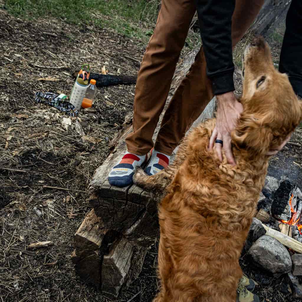 Three lightweight GRIP6 Campfire Hike Crew merino wool socks laid out, showcasing their cozy, durable design for outdoor activities.