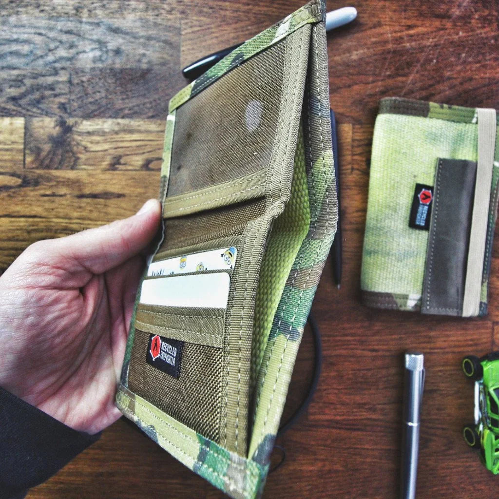 Recycled Firefighter Captain Wallet in combat leather with firehose texture, featuring multiple card slots and a sleek design.