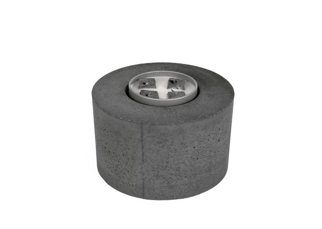 Classic Cylinder Concrete Fire Pit by City Bonfires with a smooth finish and flickering flames in an outdoor setting.
