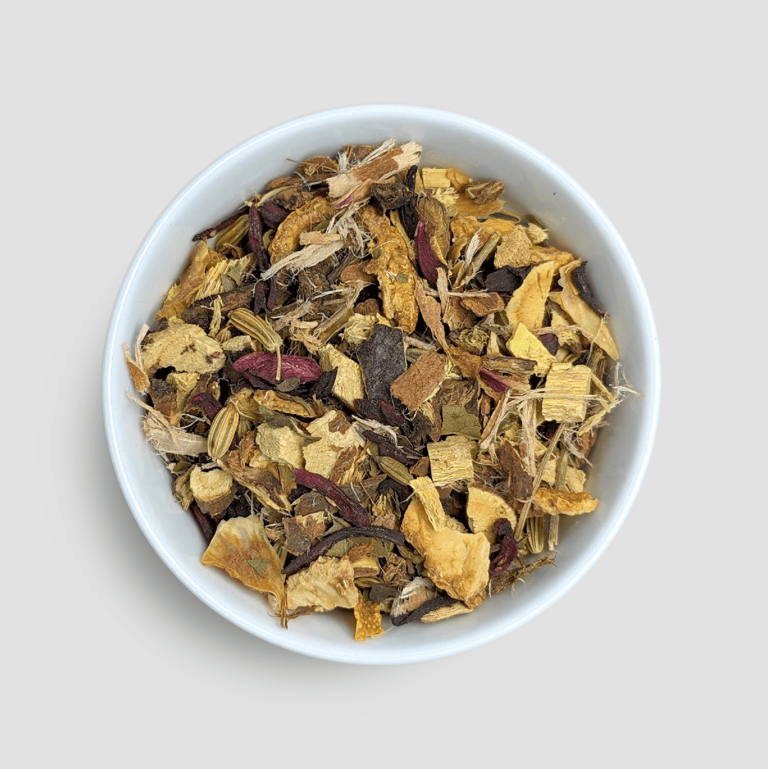 Clear My Throat herbal tea from Little Prayer Tea Company displayed in a bowl on a white background.