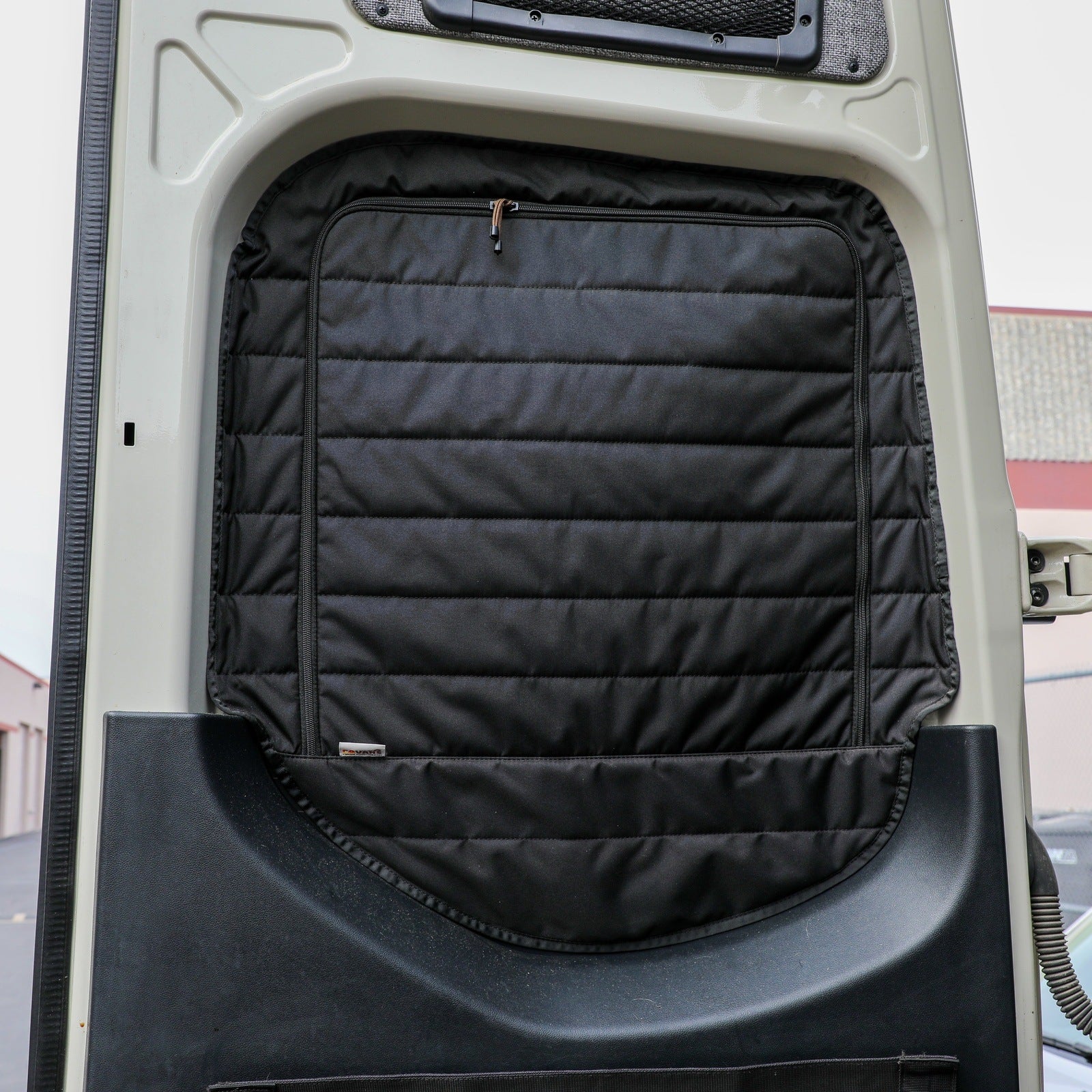 Canyon Adventure Vans CLIMA-SHADE™ insulated rear window covers set for enhanced vehicle insulation and privacy.