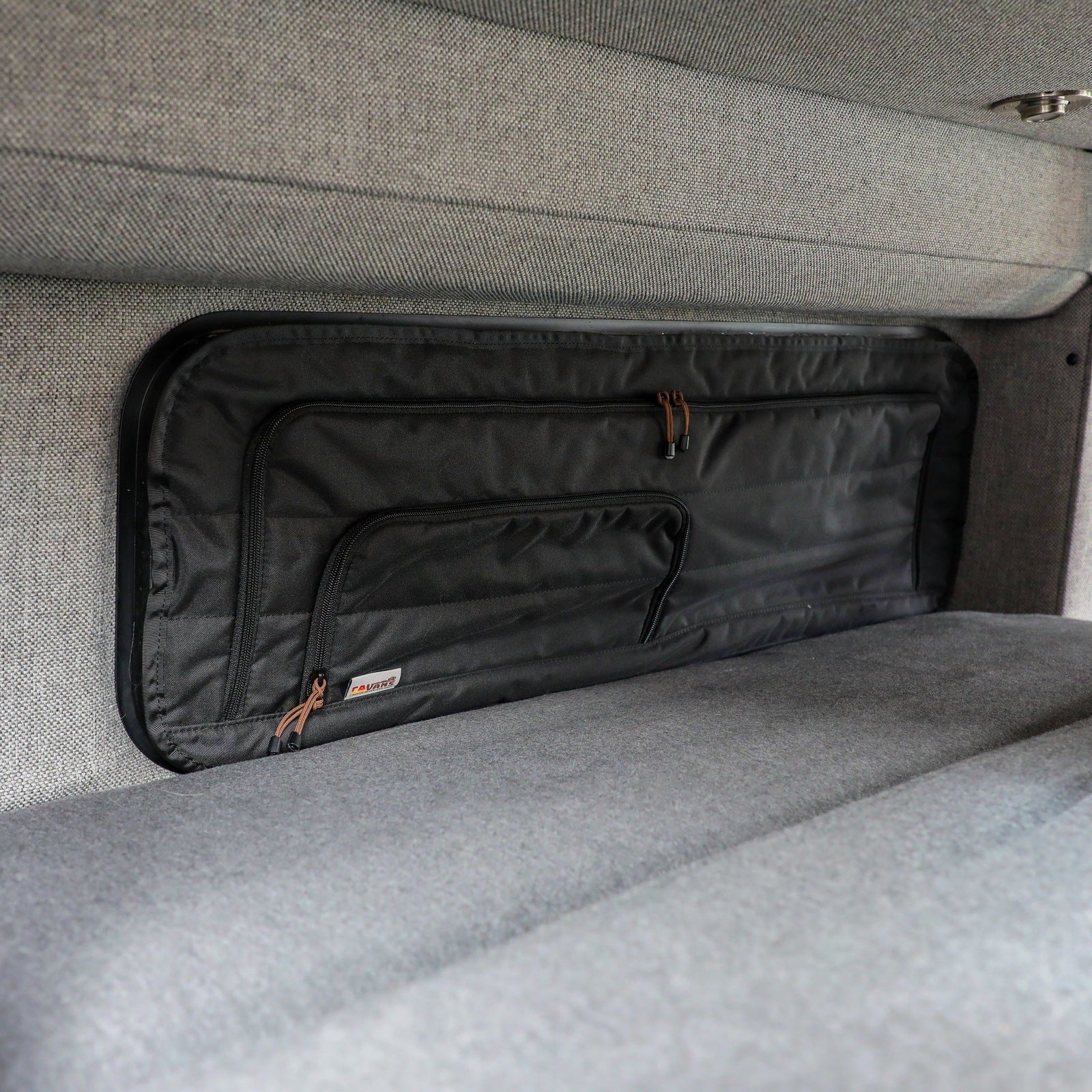 Canyon Adventure Vans CLIMA-SHADE insulated bunk window cover with black exterior and reflective interior, designed for camper vans.