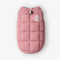 The Wild Paw Cloudshell Vest, a lightweight jacket in shady rose, featuring a sleek design and durable fabric.