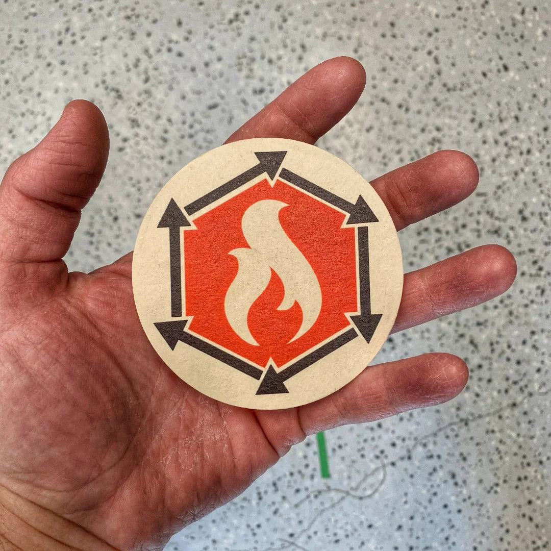 Recycled Firefighter coaster featuring logo design, perfect for protecting surfaces and adding a unique touch to home decor.