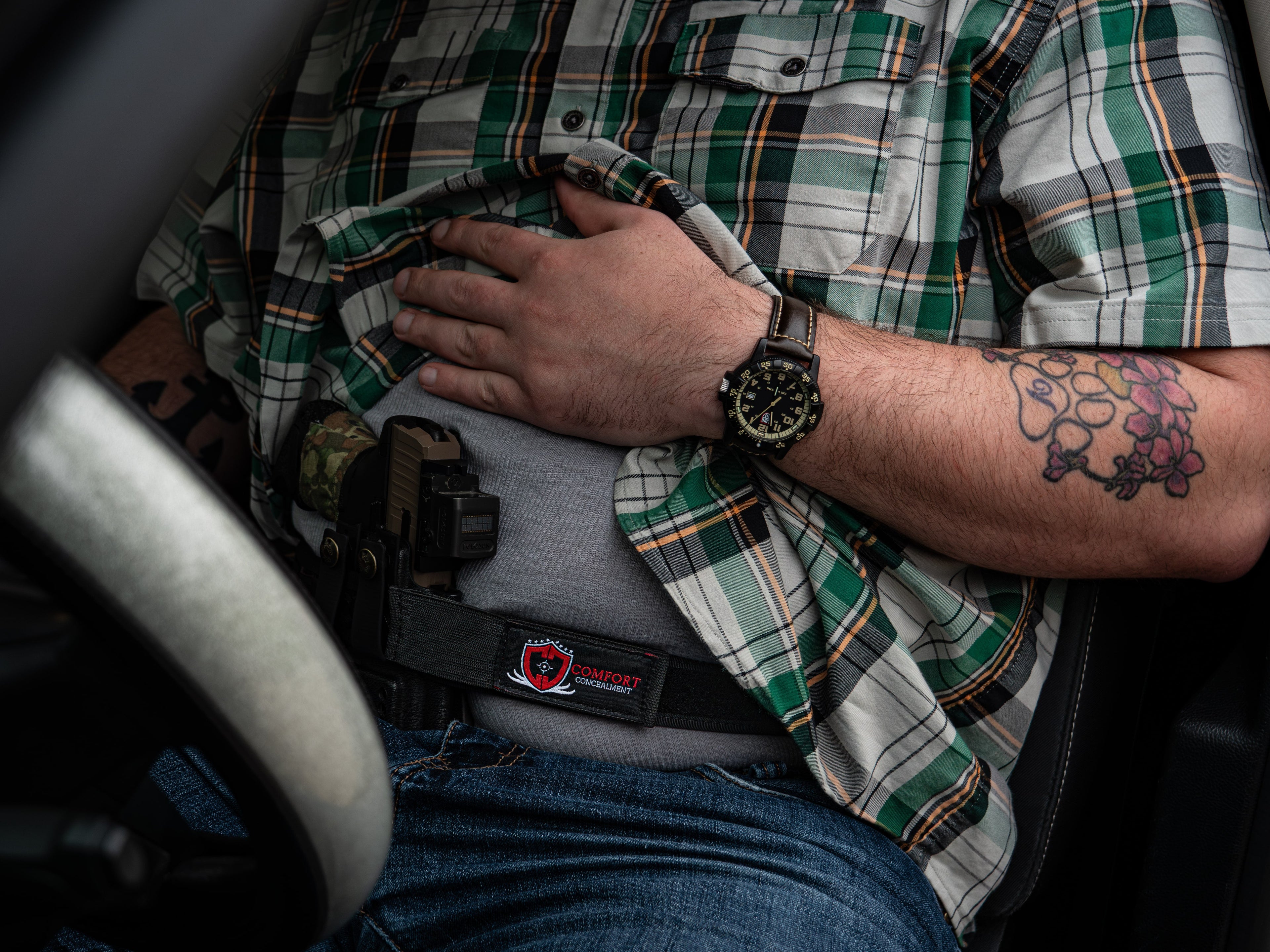 Comfort Concealment BLACKOUT 2.0™ concealed carry belt shown in a lifestyle setting, highlighting its sleek design and sturdy construction.