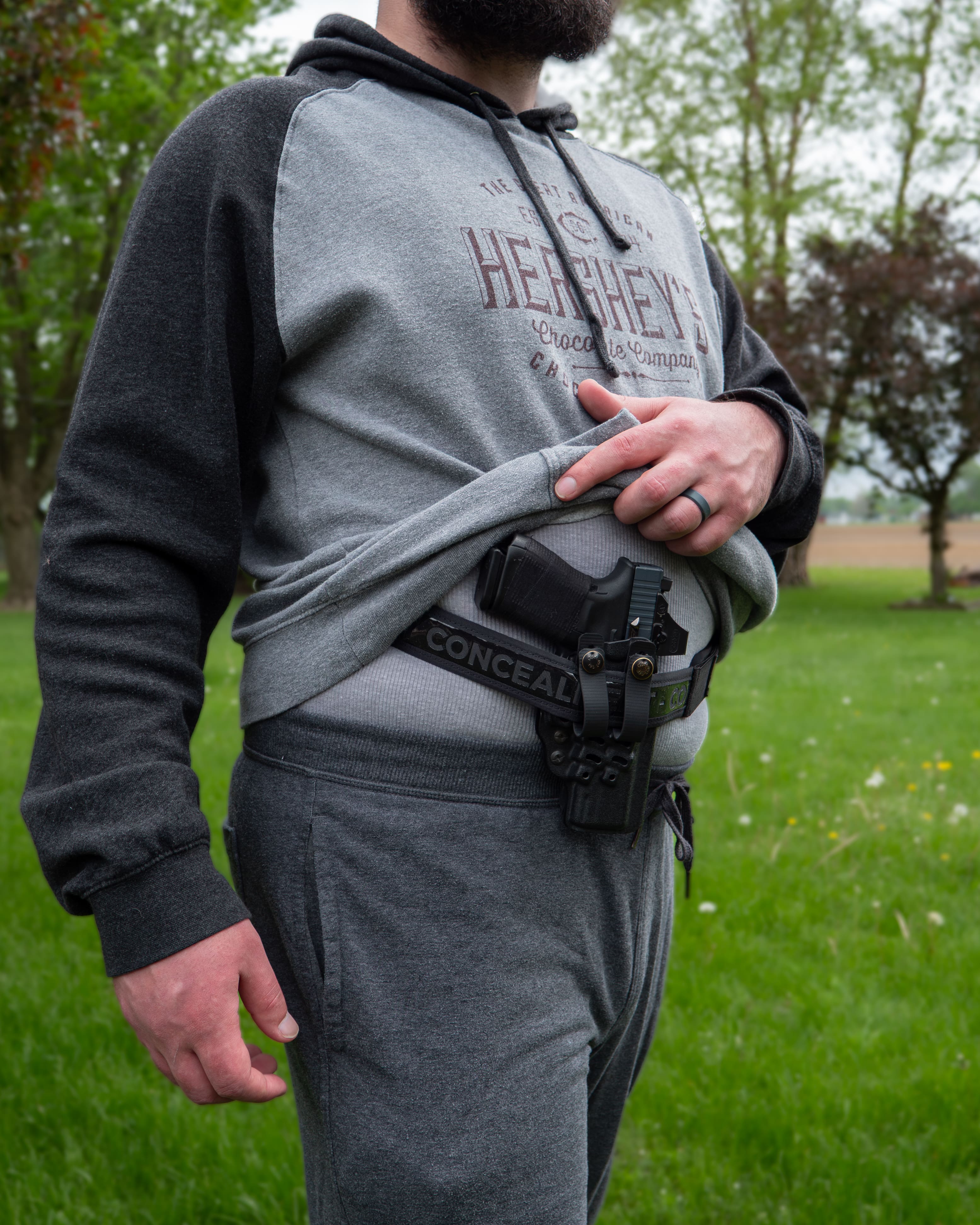 Comfort Concealment BLACKOUT 2.0 concealed carry belt shown in a lifestyle setting, highlighting its durable design and secure fit.