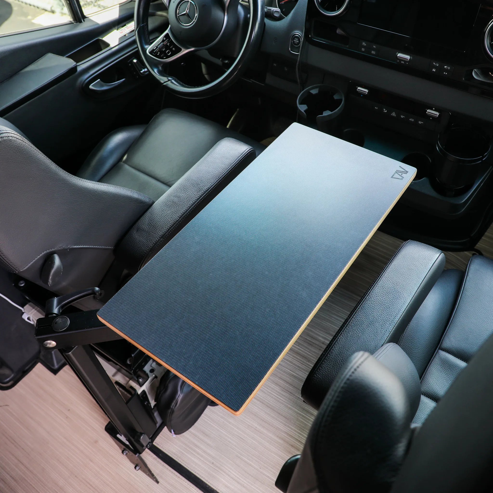Canyon Adventure Vans CAV branded small universal table top with a smooth surface and compact design for versatile use