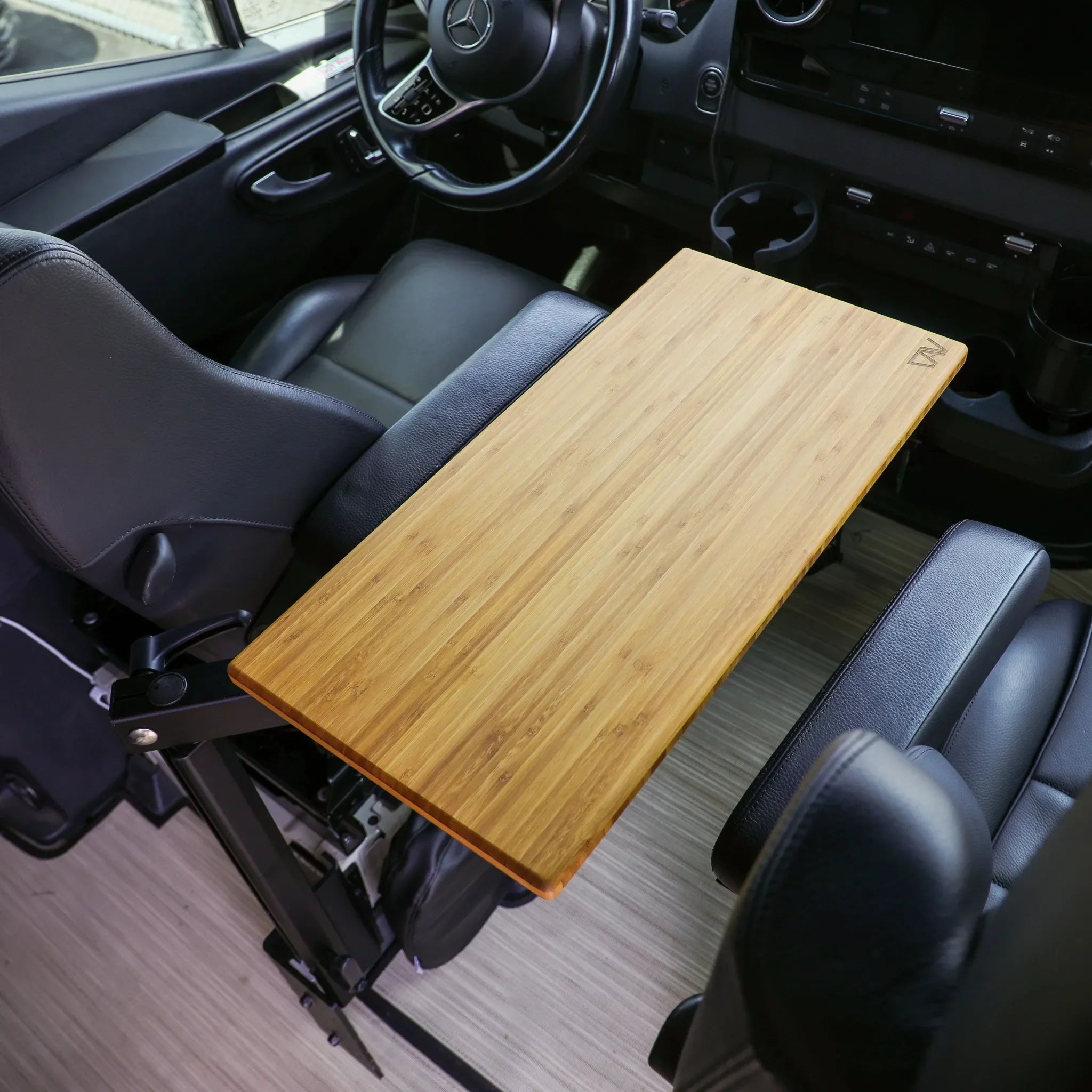 Canyon Adventure Vans small universal table top from CAV branded products, shown on a smooth surface with detailed texture.