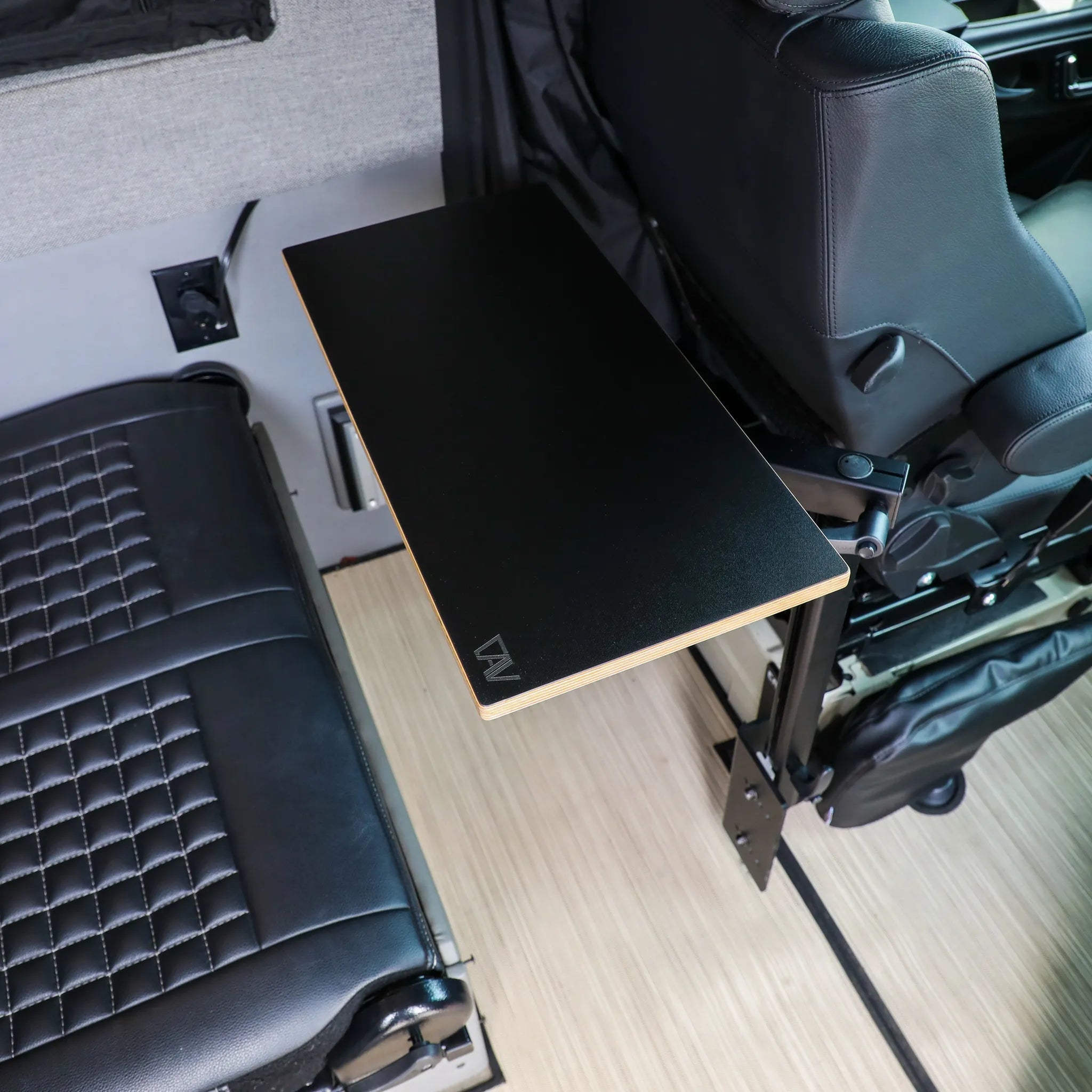 Small universal table top from Canyon Adventure Vans, designed for versatile use with CAV branded products, shown on a console.