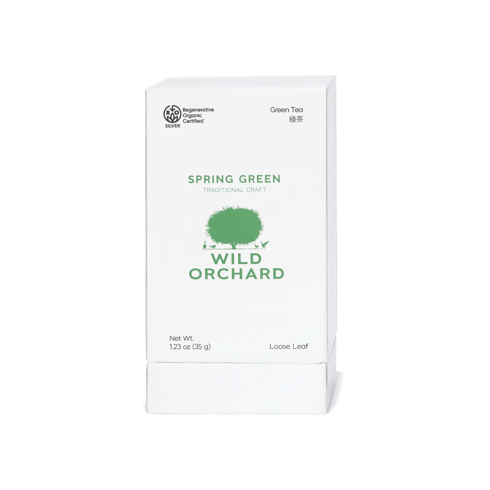 Loose leaf Spring Green organic green tea by Wild Orchard in a vibrant green color displayed in a tea infuser.