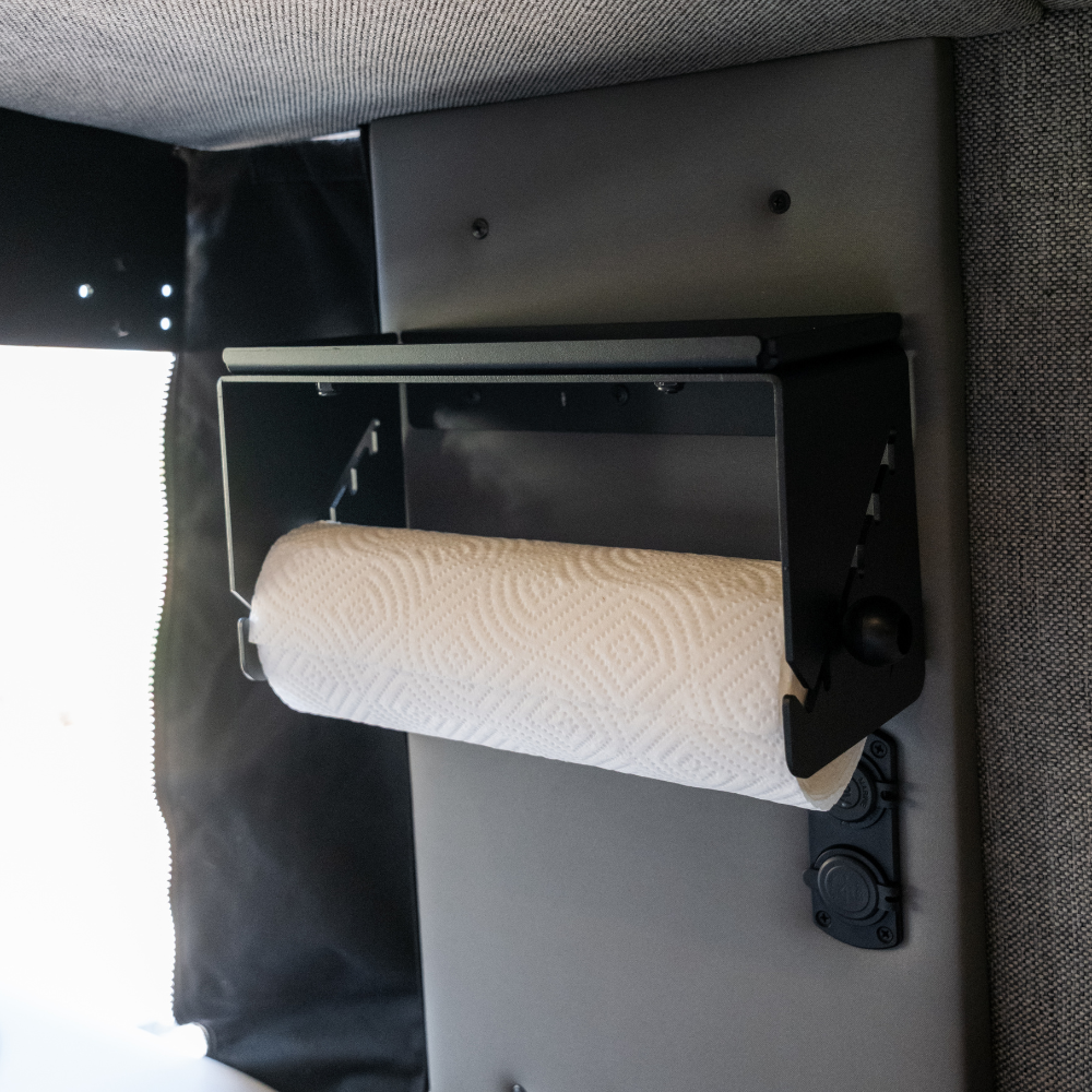 Canyon Paper Towel Holder made in Utah by Canyon Adventure Vans, mounted on a kitchen countertop with paper towels.