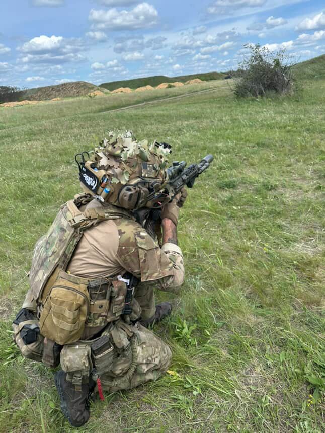 Redemption Tactical RT Crusader 2.0 armor kit with lightweight Level IV front and back plates, shown in combat-ready vest setup.