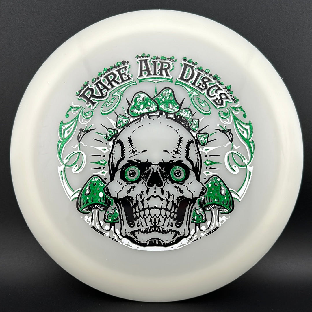Disc golf disc by Rare Air Discs featuring Forged Radiant Era Crushin' Amanitas stamp, with vibrant graphic design.
