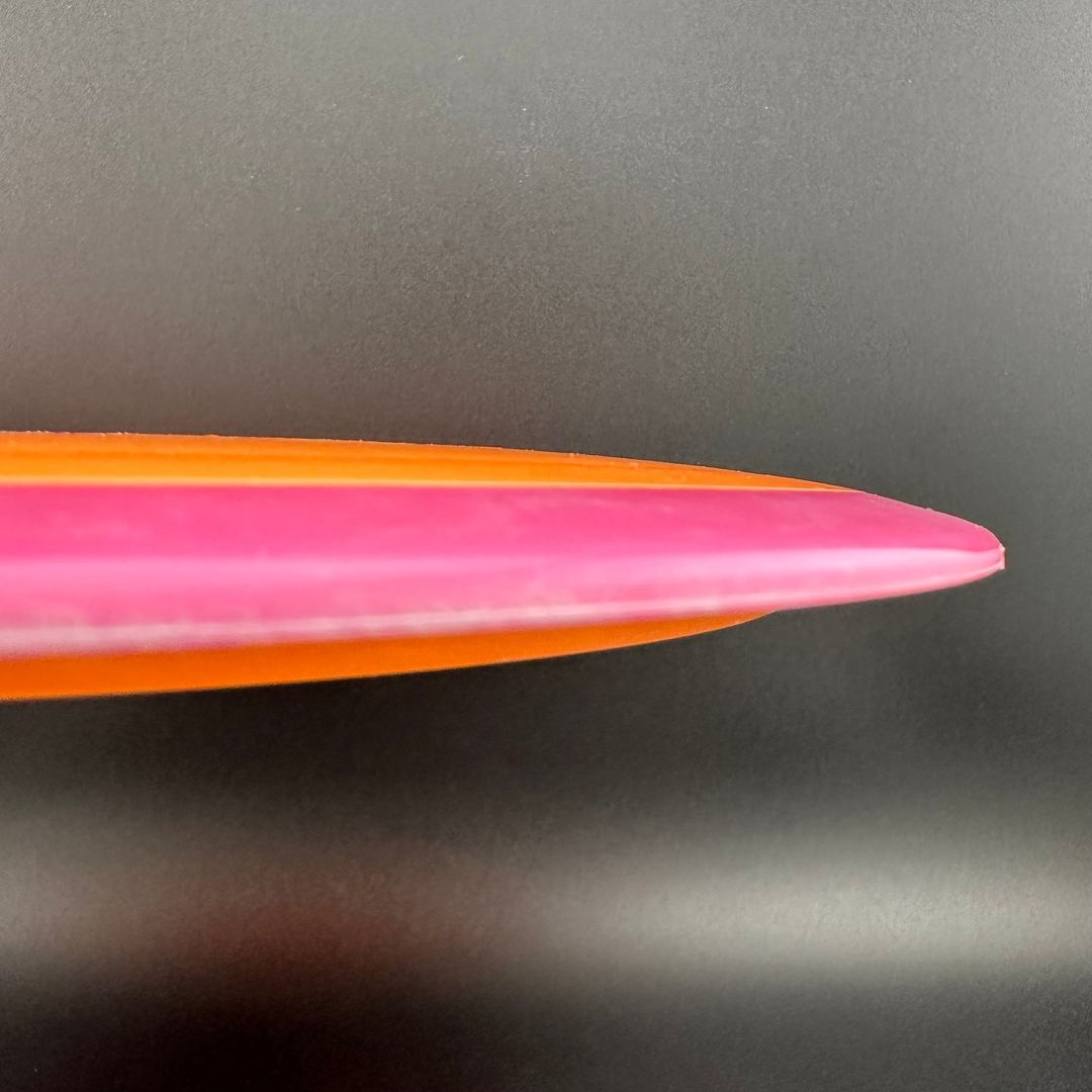 Rare Air Discs Fission Defy Crushin' Amanitas VIP 2.0 disc golf disc with vibrant design and durable plastic for throwing.