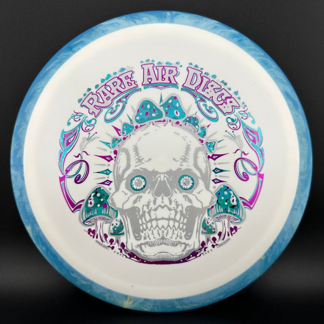 Rare Air Discs Fission Defy Crushin' Amanitas VIP 2.0 disc golf disc with colorful artwork and aerodynamic design