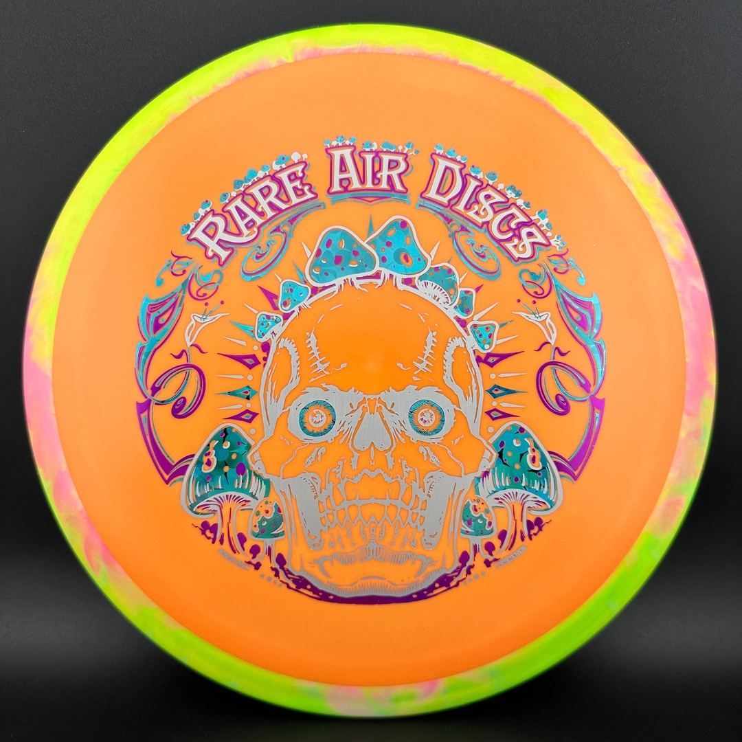 Fission Defy Crushin' Amanitas VIP 2.0 disc golf disc by Rare Air Discs, featuring vibrant artwork and aerodynamic design
