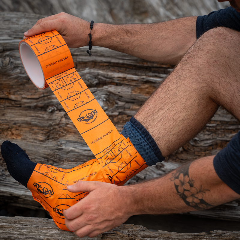 Duct-Aid 10' Travel Ready Tape roll displayed on a white background, showcasing its durable, flexible design.
