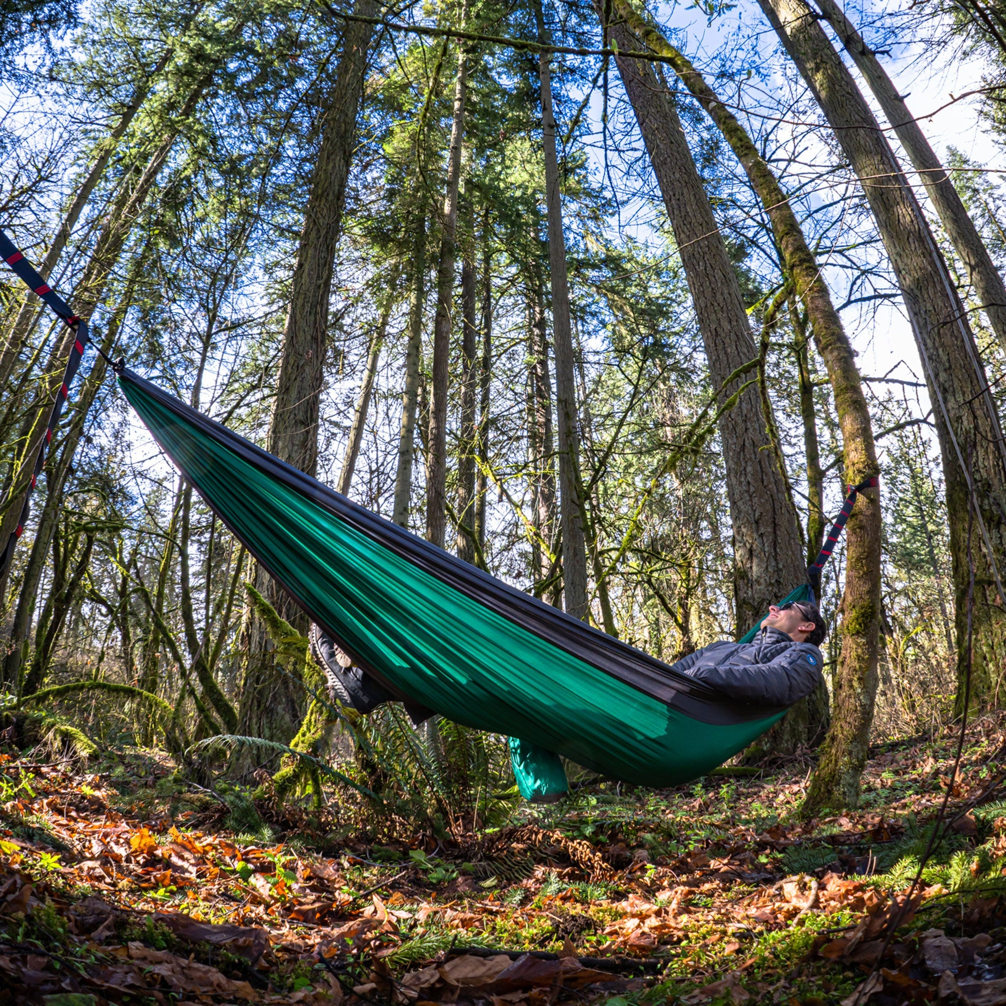 GrandTrunk Double Deluxe Hammock with straps, showing soft, durable fabric and sturdy hanging straps for outdoor relaxation.