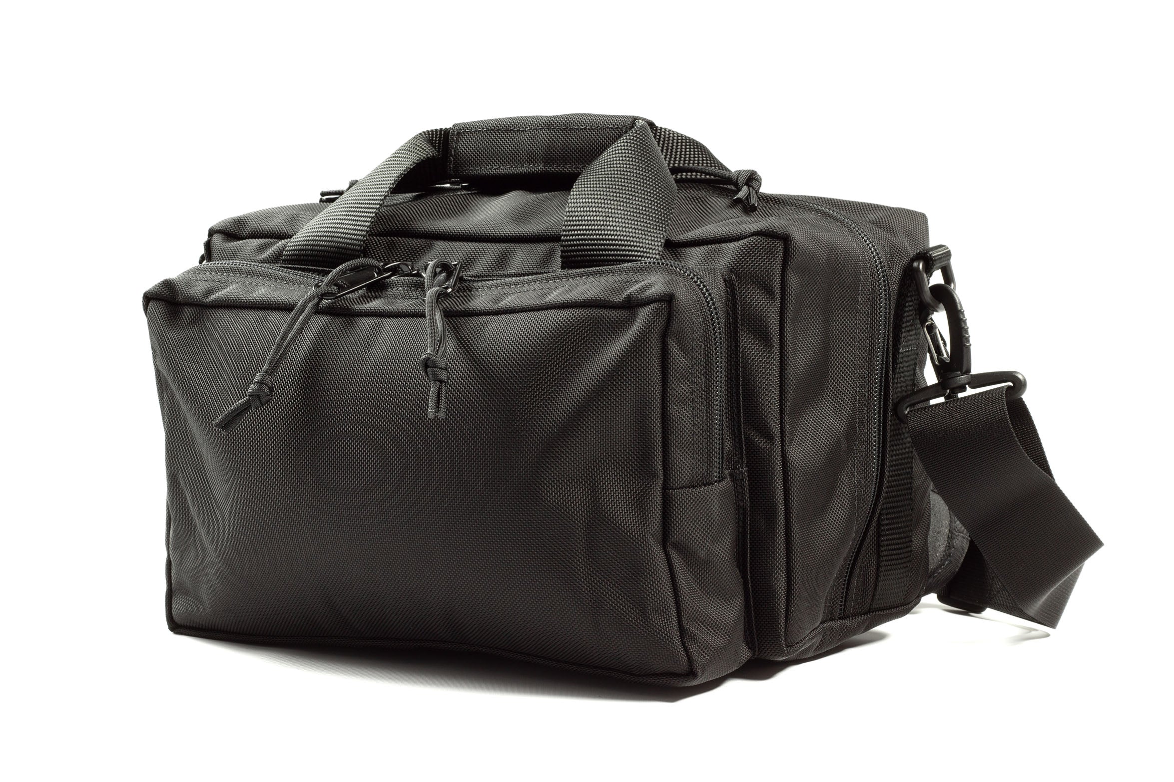Elite Survival Systems Ballistic Flight Bag in side view, showcasing durable fabric and spacious compartments for travel.