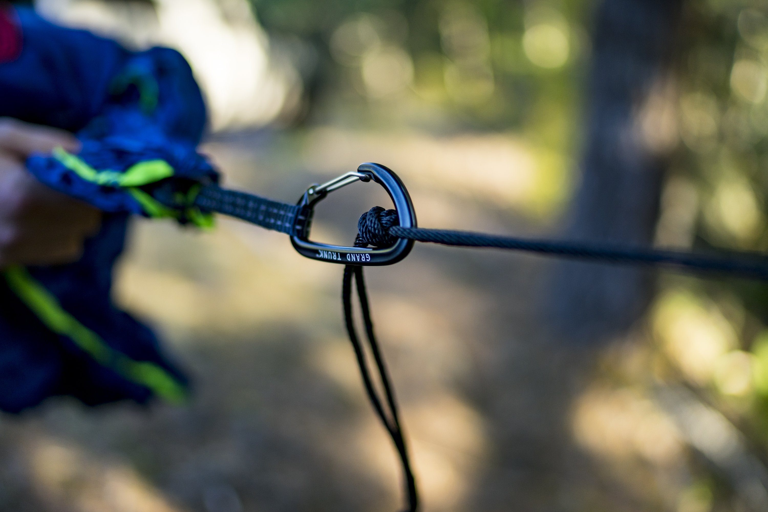 Pair of GrandTrunk aluminum wiregate carabiners, lightweight climbing accessories with secure wiregate closures.