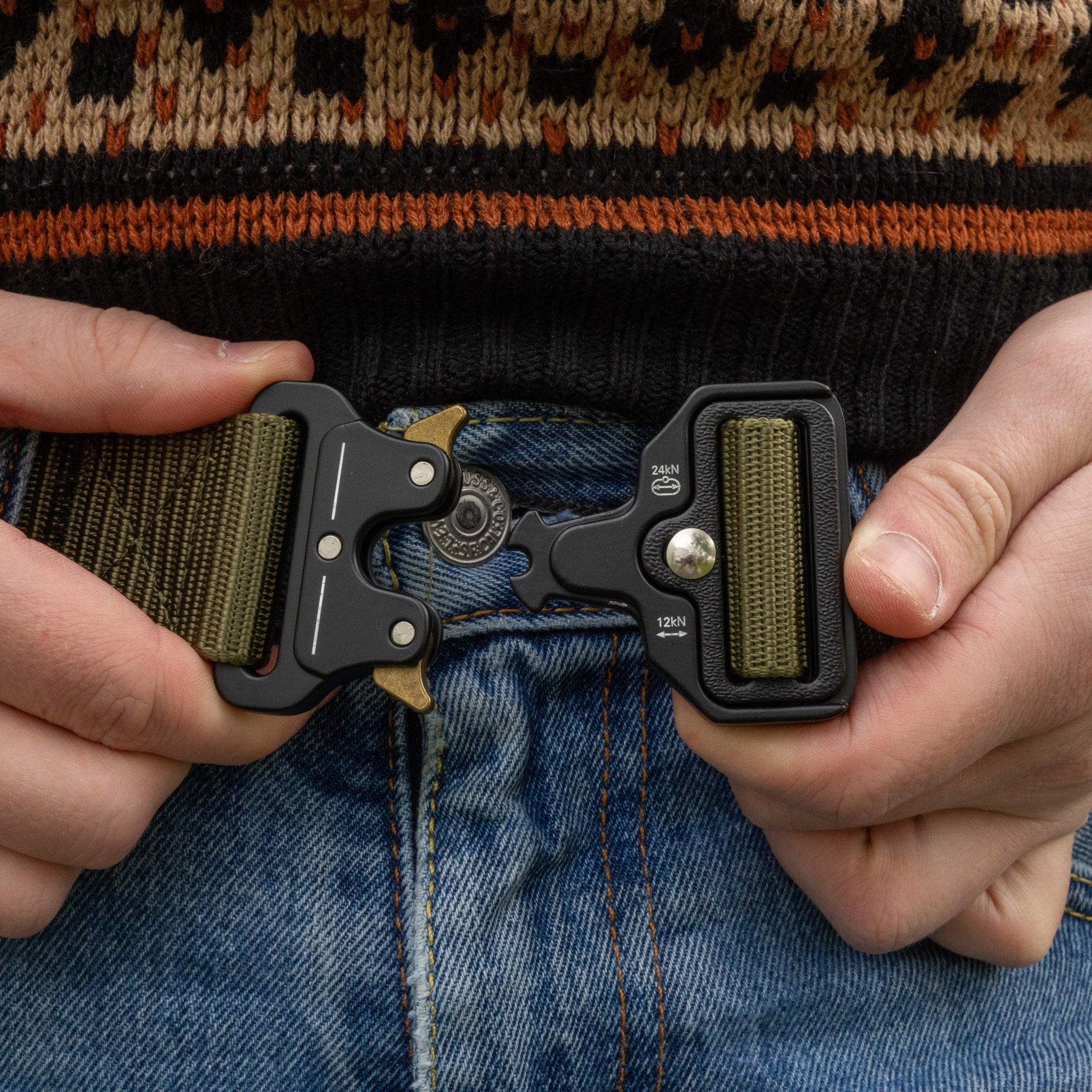 Canvas EDC belt by Americana Pipedream Apparel, showcasing a durable fabric and adjustable buckle in a casual setting.