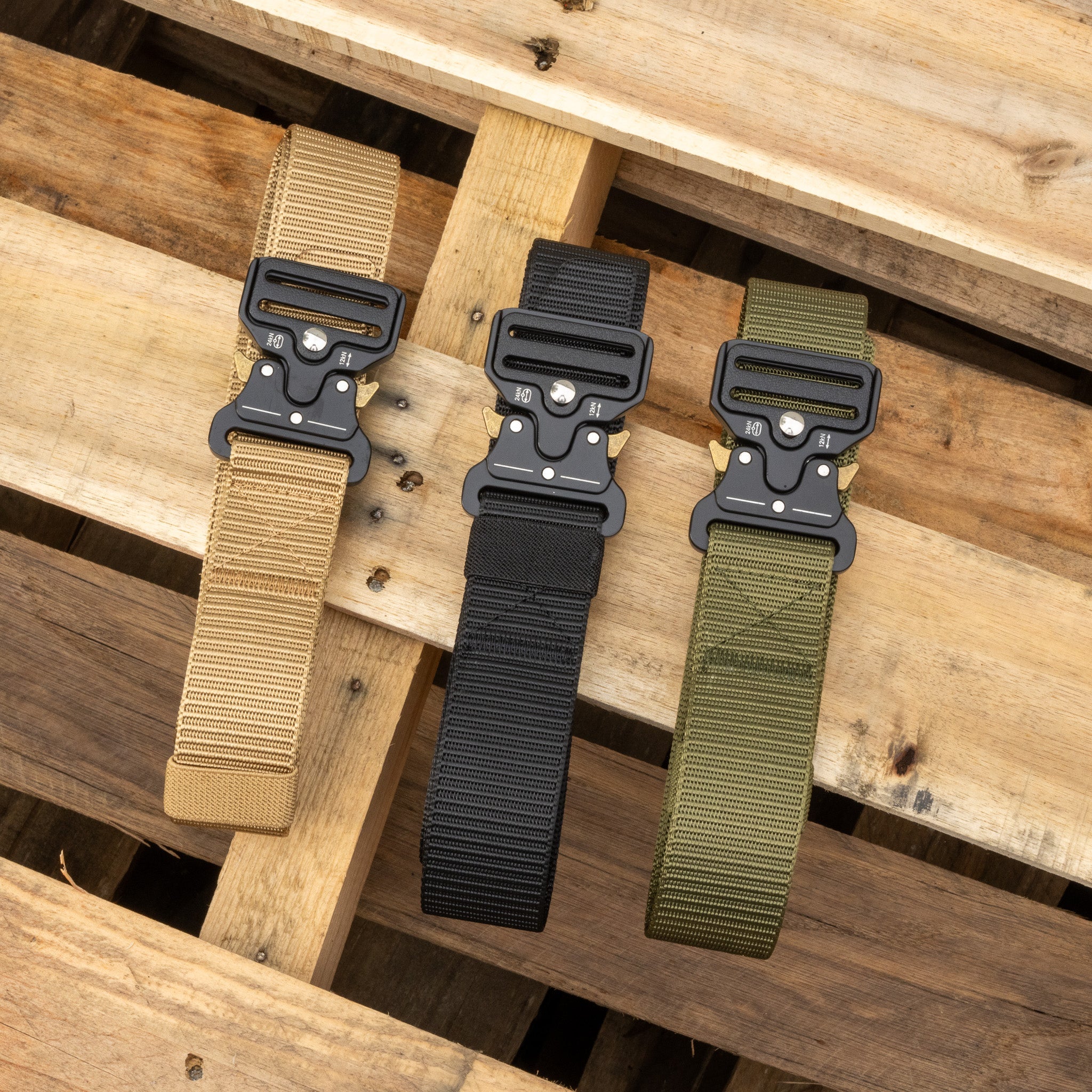 Canvas EDC belt from Americana Pipedream Apparel displayed in a neutral setting, showcasing its durable fabric and design.