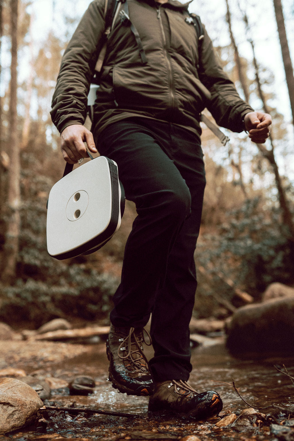 EverUncharted Nomad Seat in Sand Stone, lightweight outdoor camping stool with sturdy design and natural earthy tones.