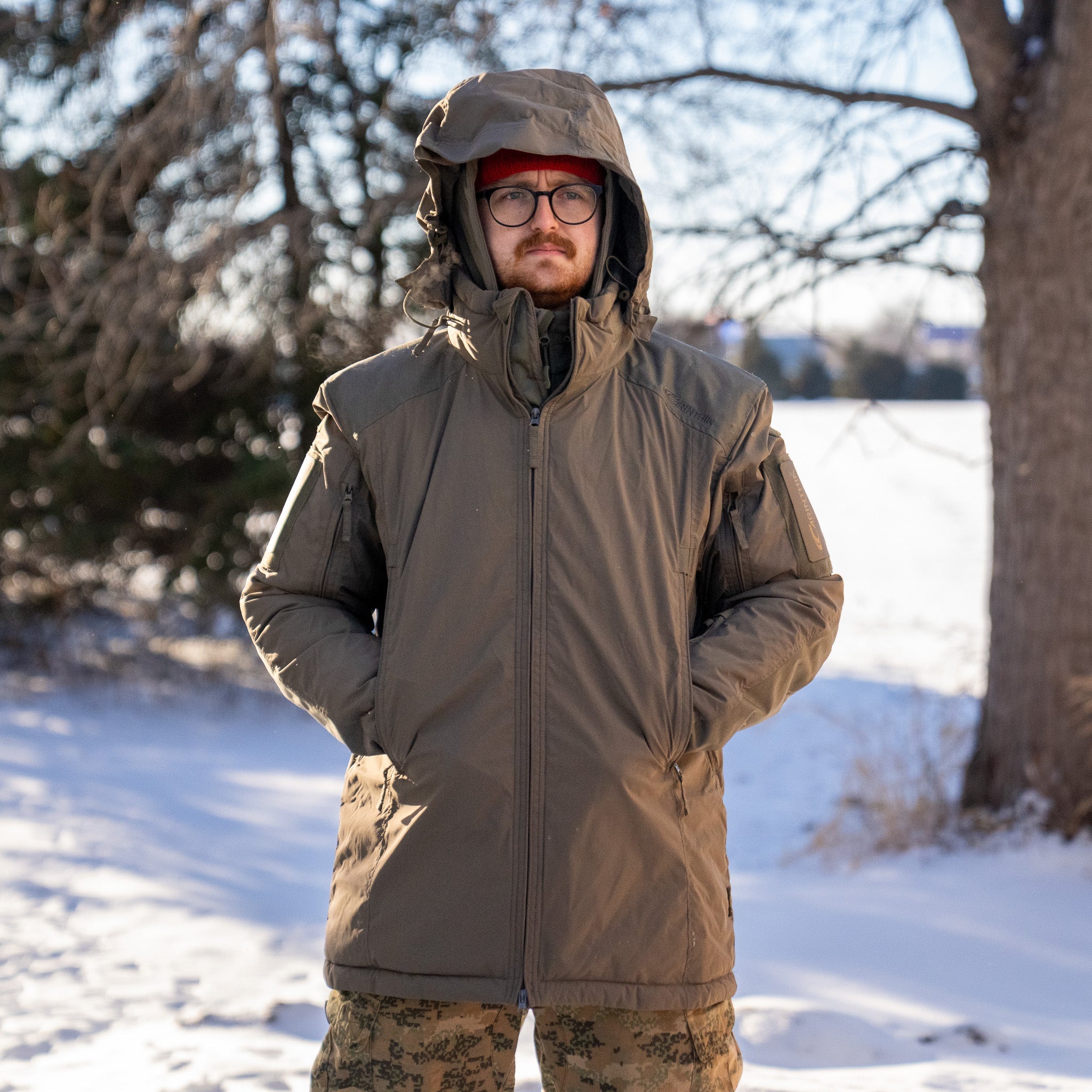 Carinthia HIG 4.0 Jacket by Americana Pipedream Apparel, shown in black with front zipper and high collar.
