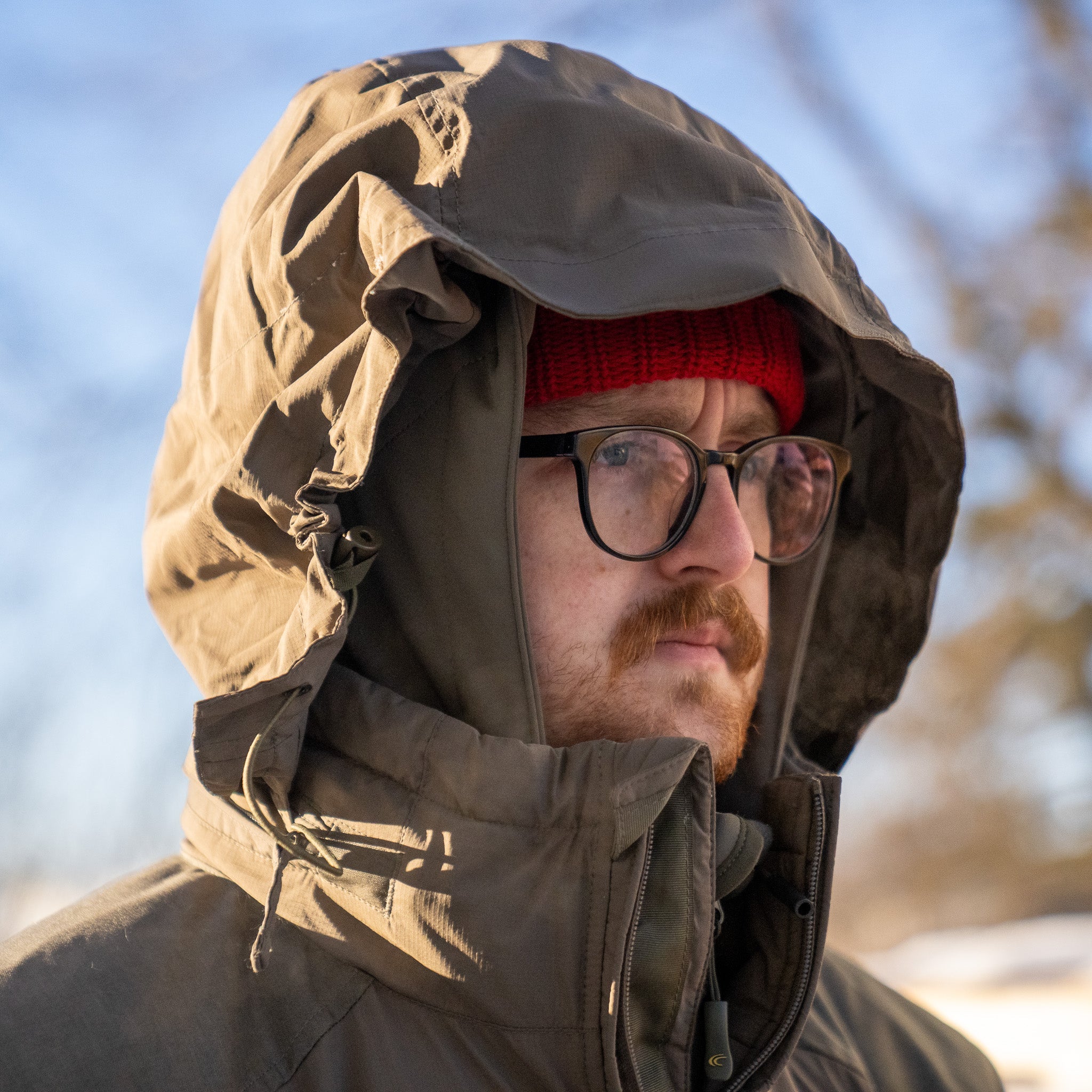 Carinthia HIG 4.0 jacket by Americana Pipedream Apparel, shown in a close-up with detailed fabric and zipper features.