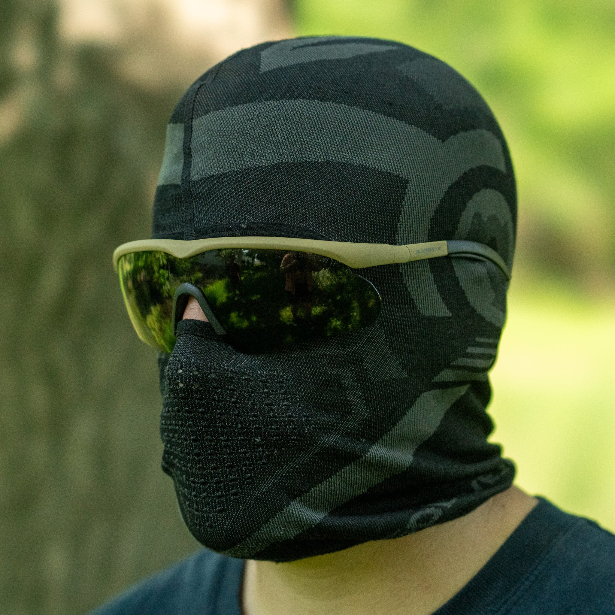 SwissEye® Raptor ballistic sunglasses with dark lenses and a sleek frame, ideal for outdoor activities and protection.